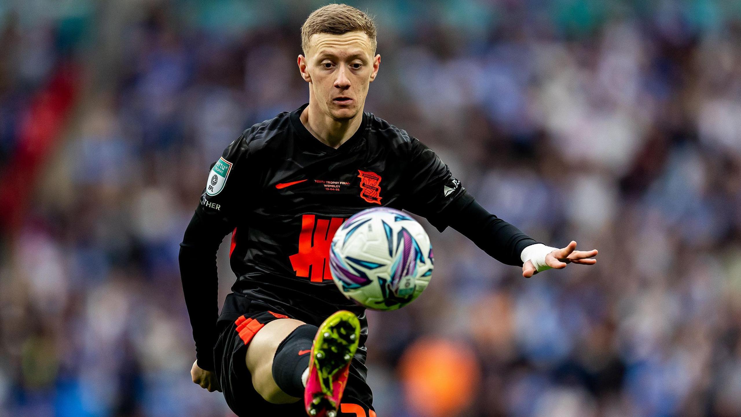 Jay Stansfield controls the ball with his right foot during a game for Birmingham City