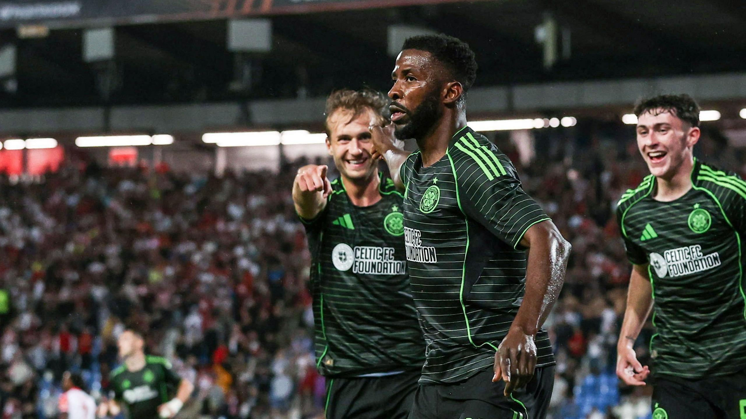 Celtic's Kelechi Iheanacho (centre) celebrates scoring to make it 1-0 during a UEFA Europa League match between FK Crvena Zvezda and Celtic at the Stadion Rajko Mitic