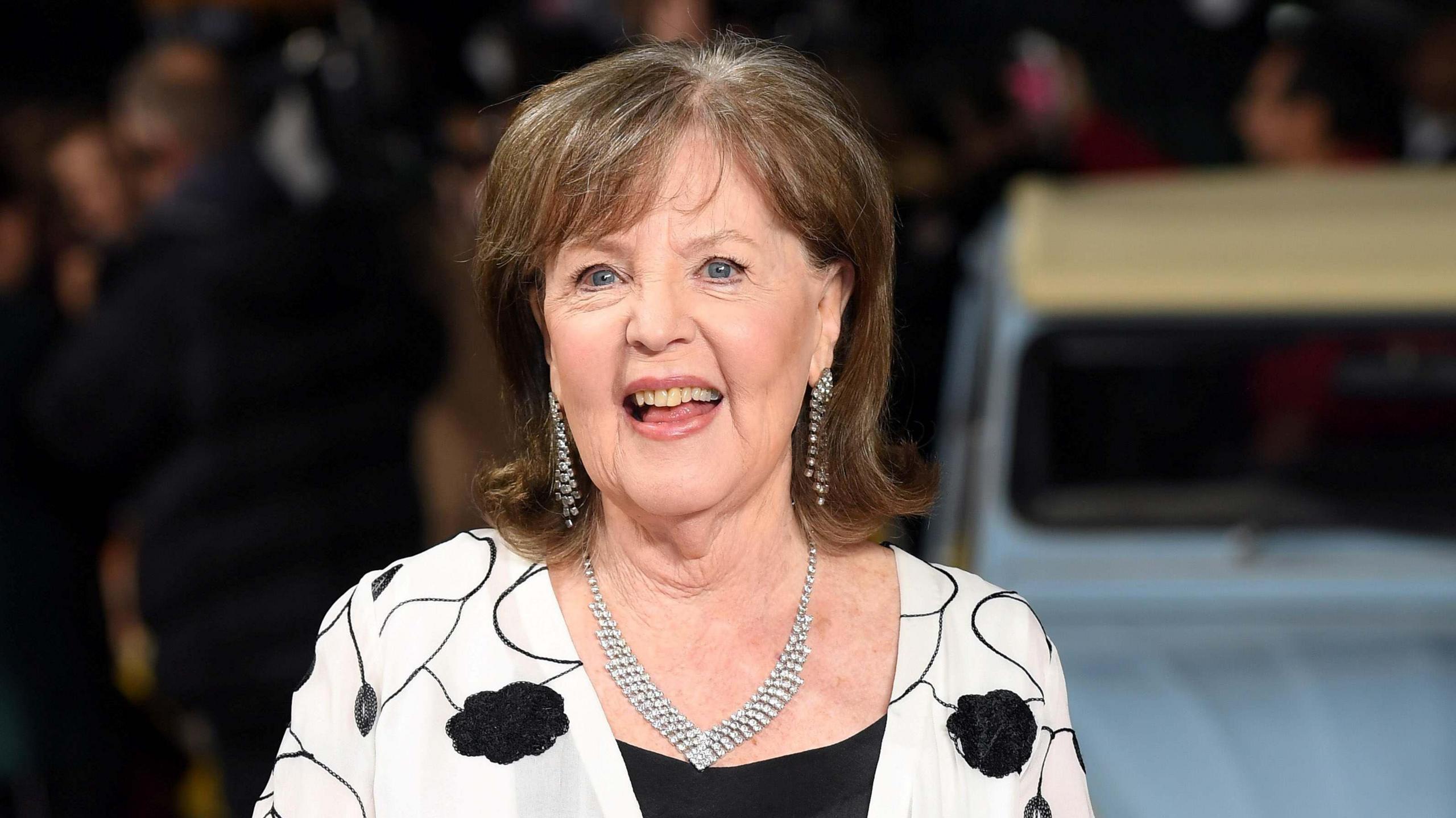 Pauline Collins pictured in 2017, she is wearing a black and white blouse