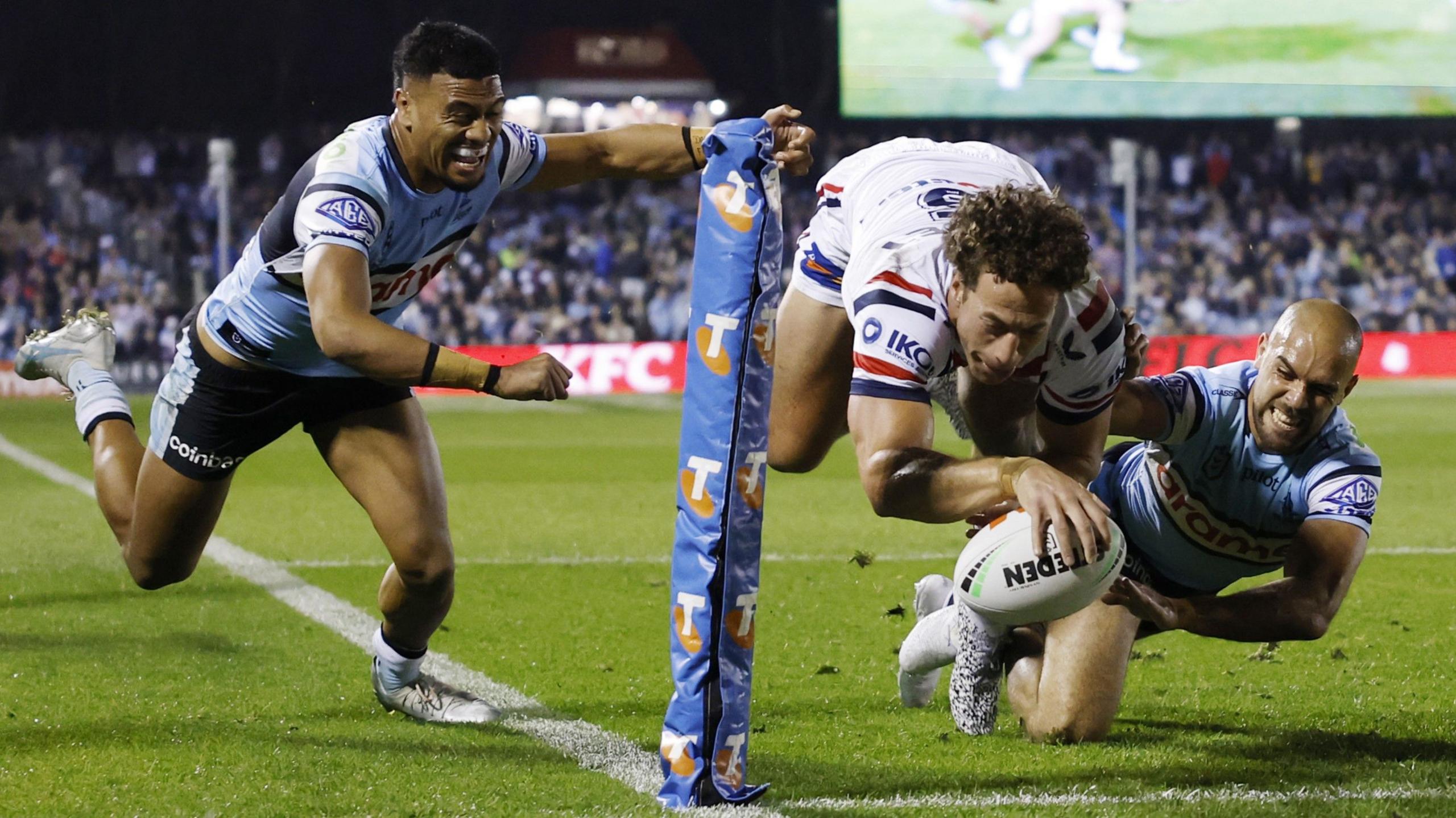 Mark Nawaqanitawase dives to score a try for Sydney Roosters