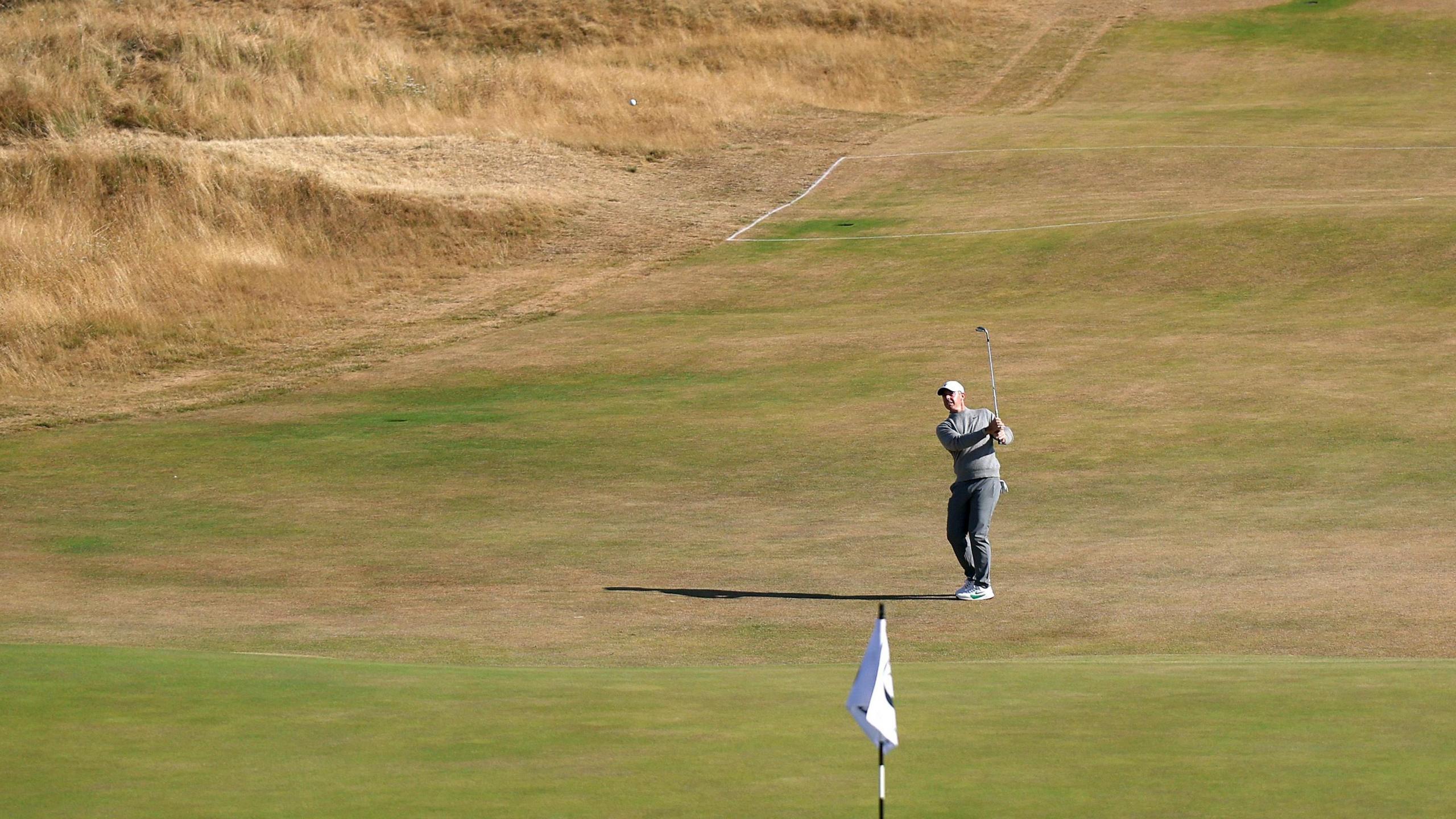 Rory McIlroy hits a shot during his practice round