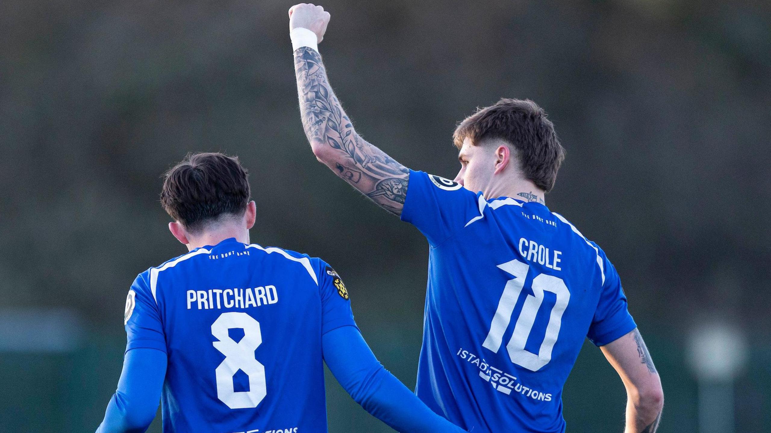 James Crole of Penybont celebrates scoring