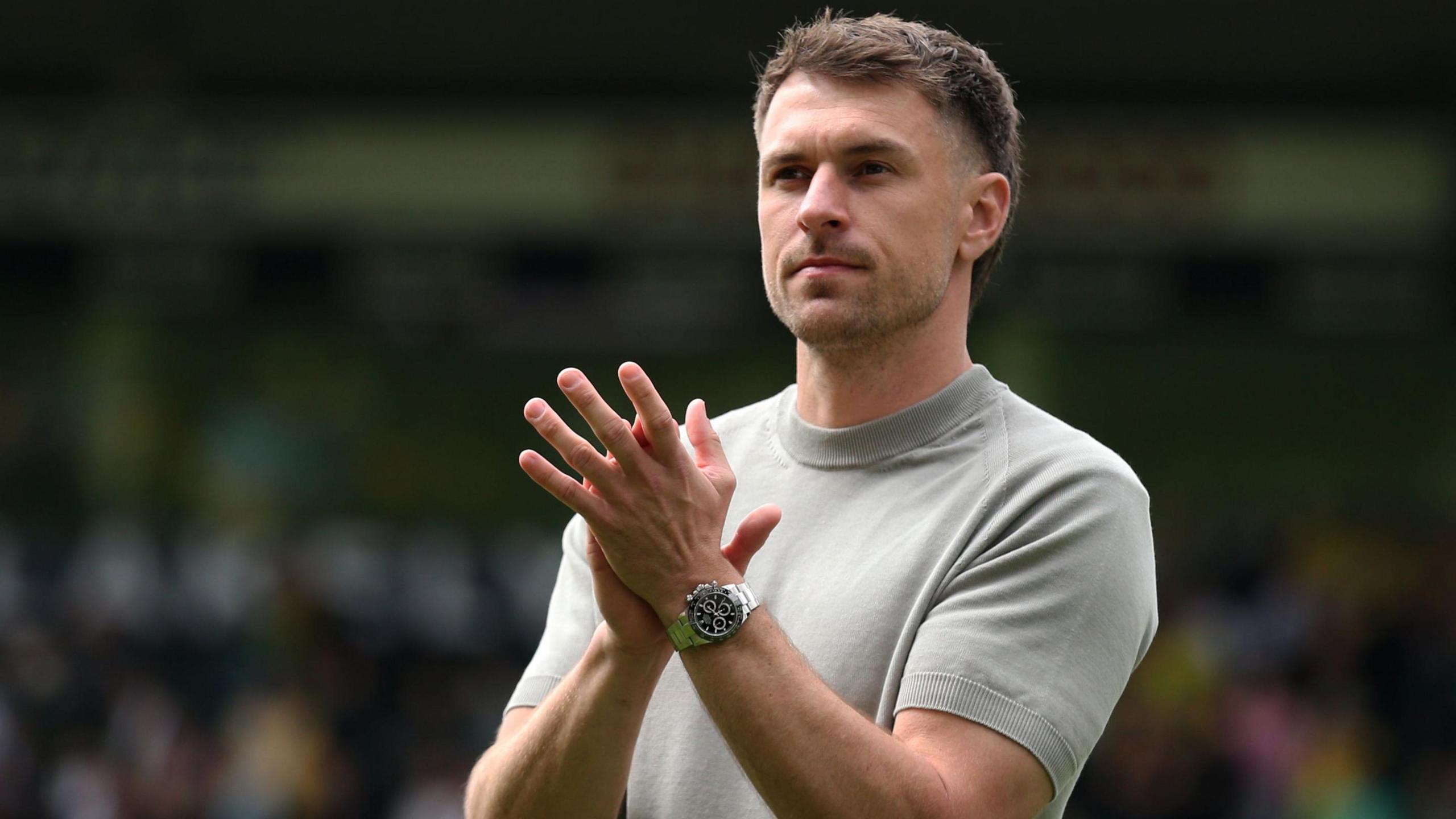 Aaron Ramsey applauds