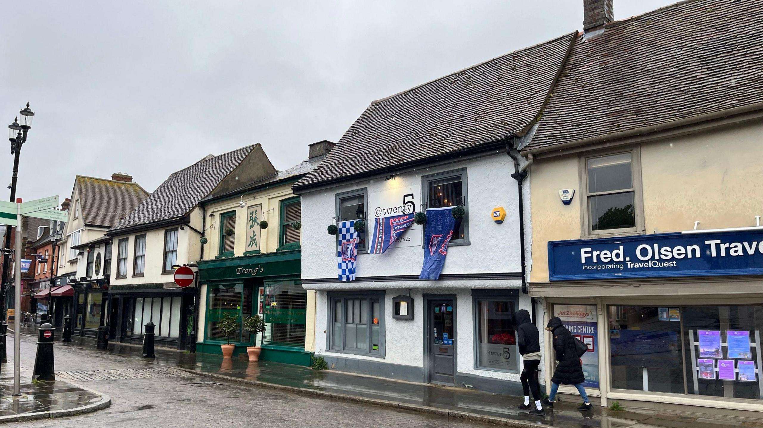 Shops and businesses across Ipswich have decorated their fronts in support of the club