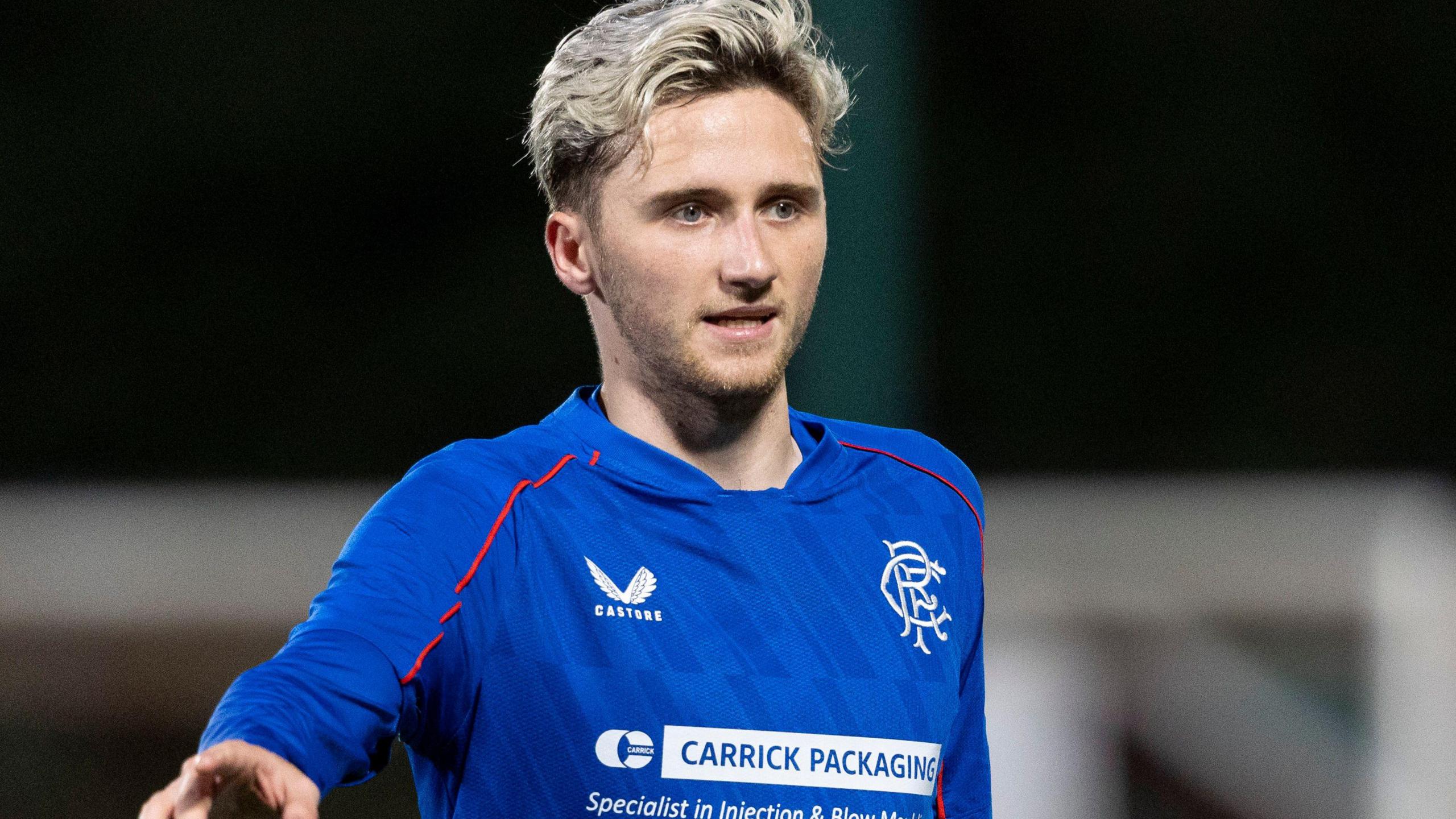 Alex Lowry in action for Rangers