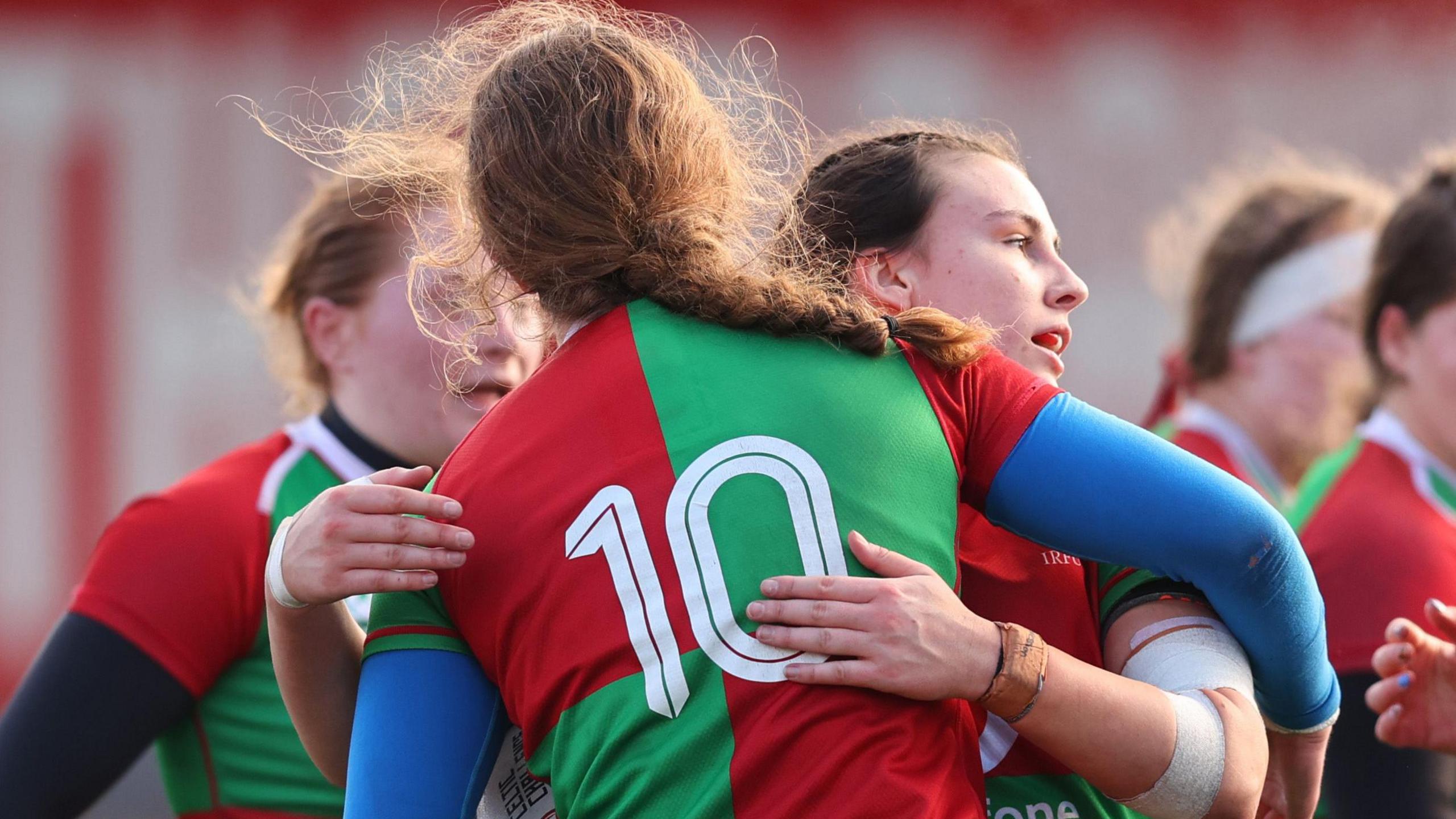 Clovers' Annakate Cournane celebrates scoring a try with team-mates