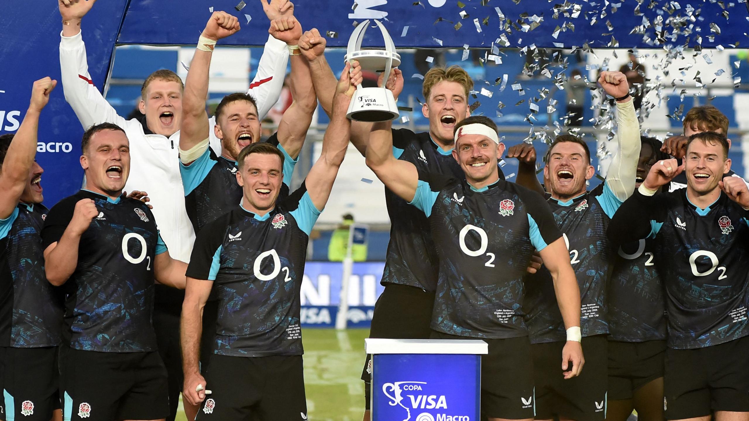 The England rugby team celebrate with the trophy after claiming a 2-0 series win in Argentina