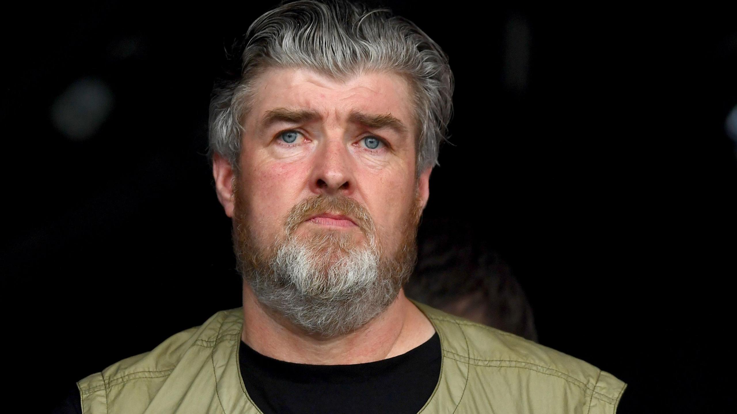 Paul Gallagher watches Liam Gallagher performs on the Pyramid stage during day four of Glastonbury Festival at Worthy Farm in June 2019