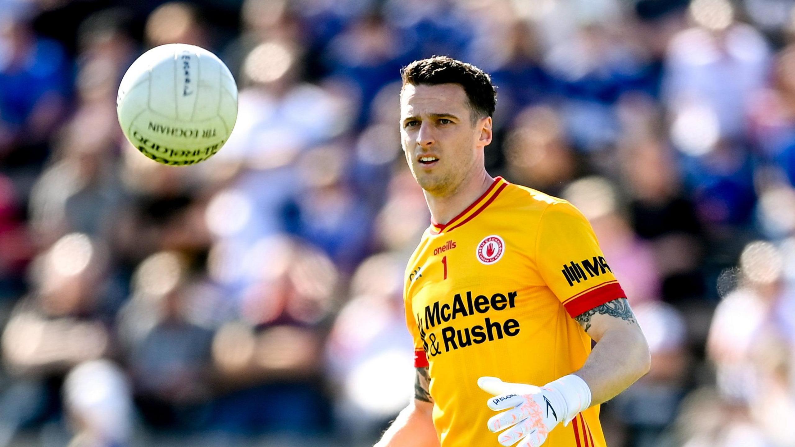 Niall Morgan kicks a ball during a Tyrone game