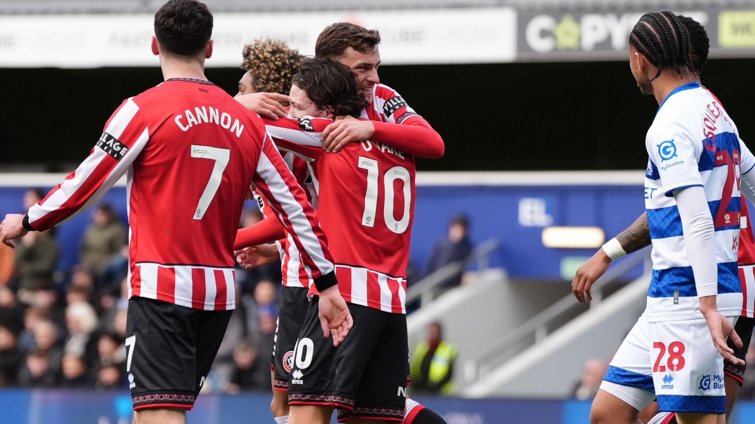 Callum O'Hare celebrates scoring the opener with his Sheffield United team-mates