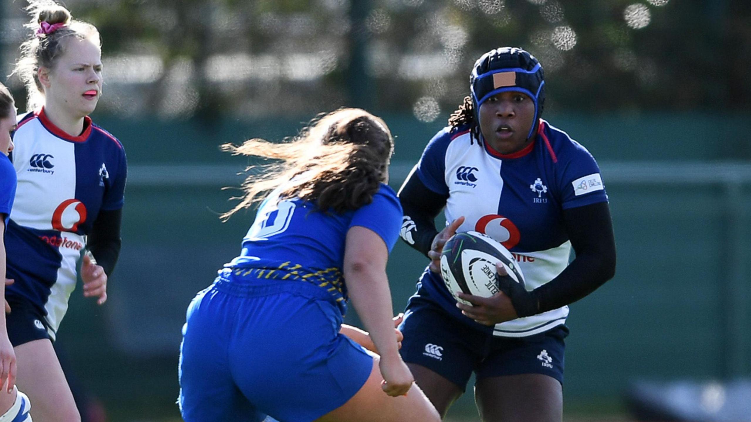 Linda Djougang of Wolfhounds is challenged by Gwennan Hopkins of Gwalia Lightning