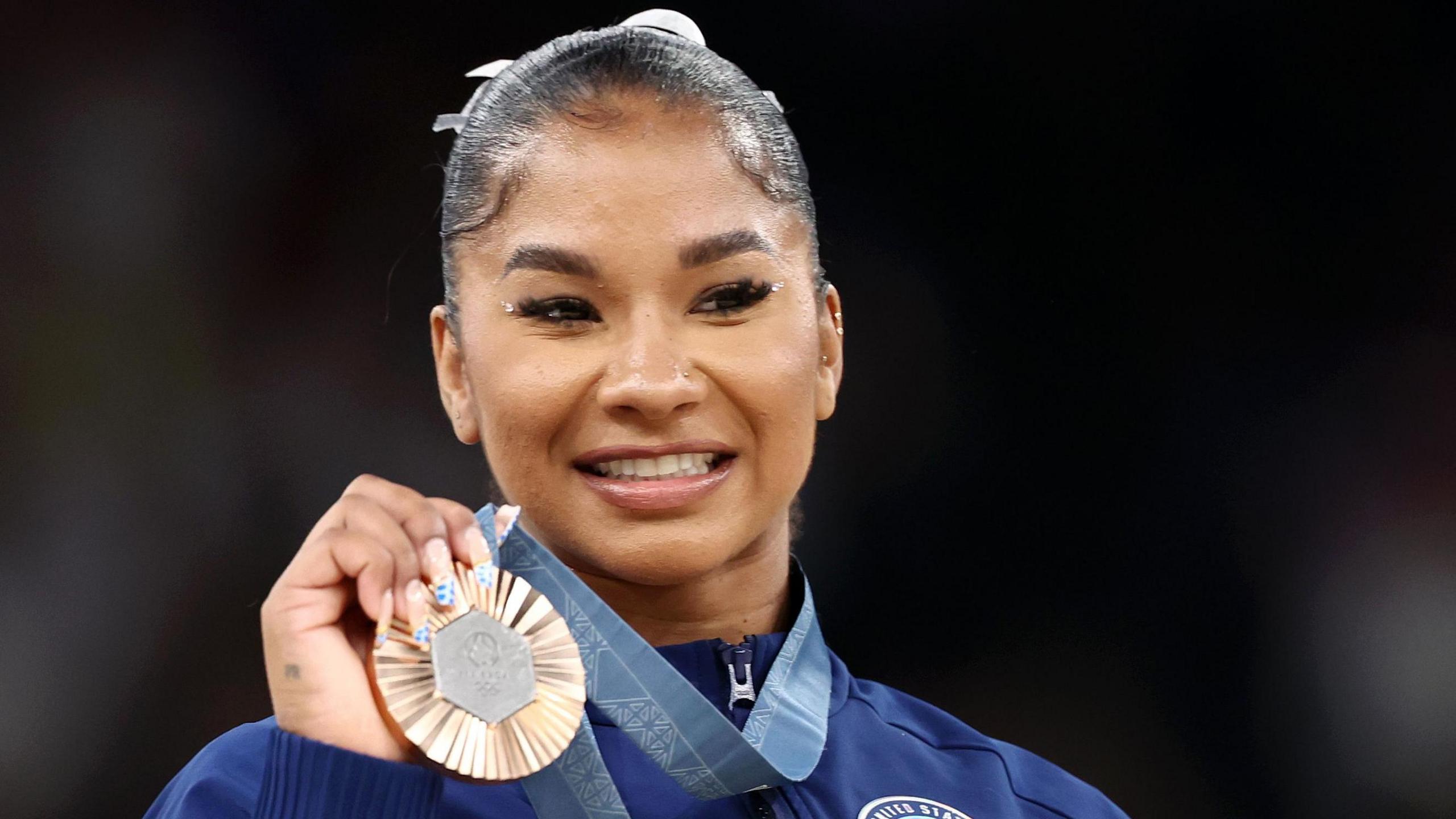 Jordan Chiles with her bronze medal