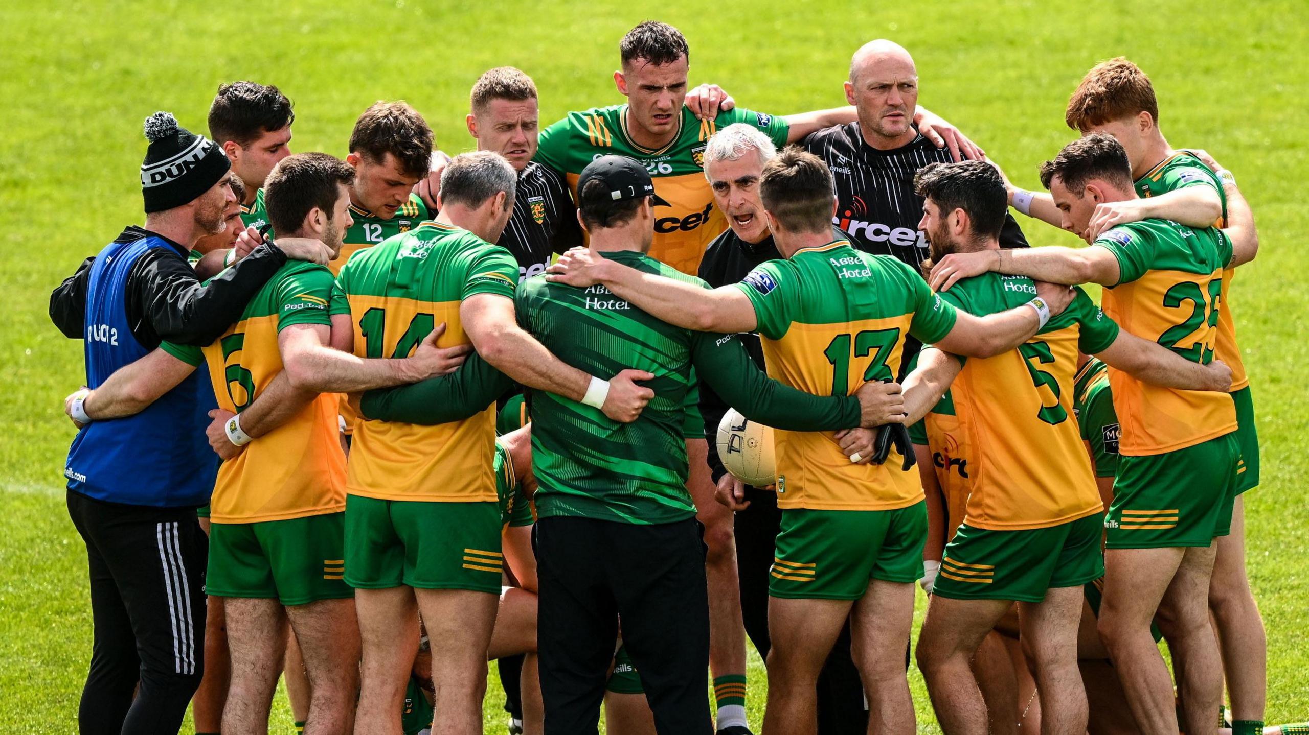Donegal boss Jim McGuinness speaks to his players before last week's win over Louth