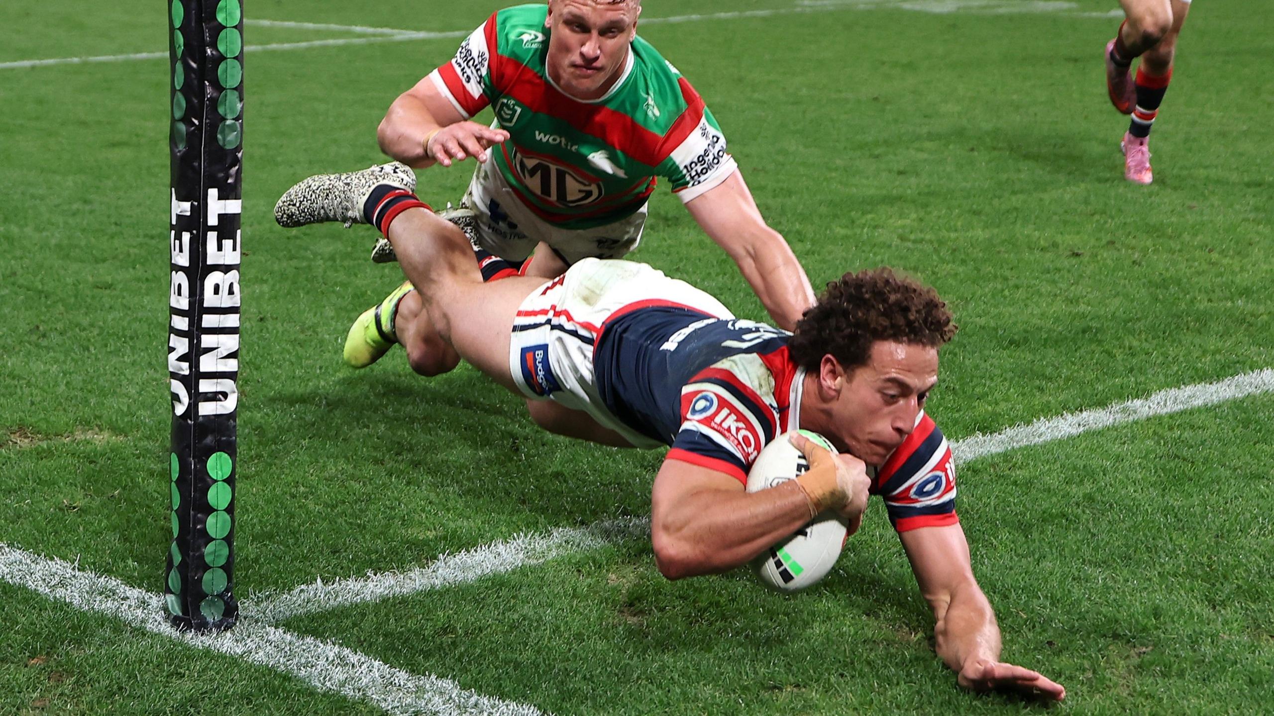 Mark Nawaqanitawase dives over for a try