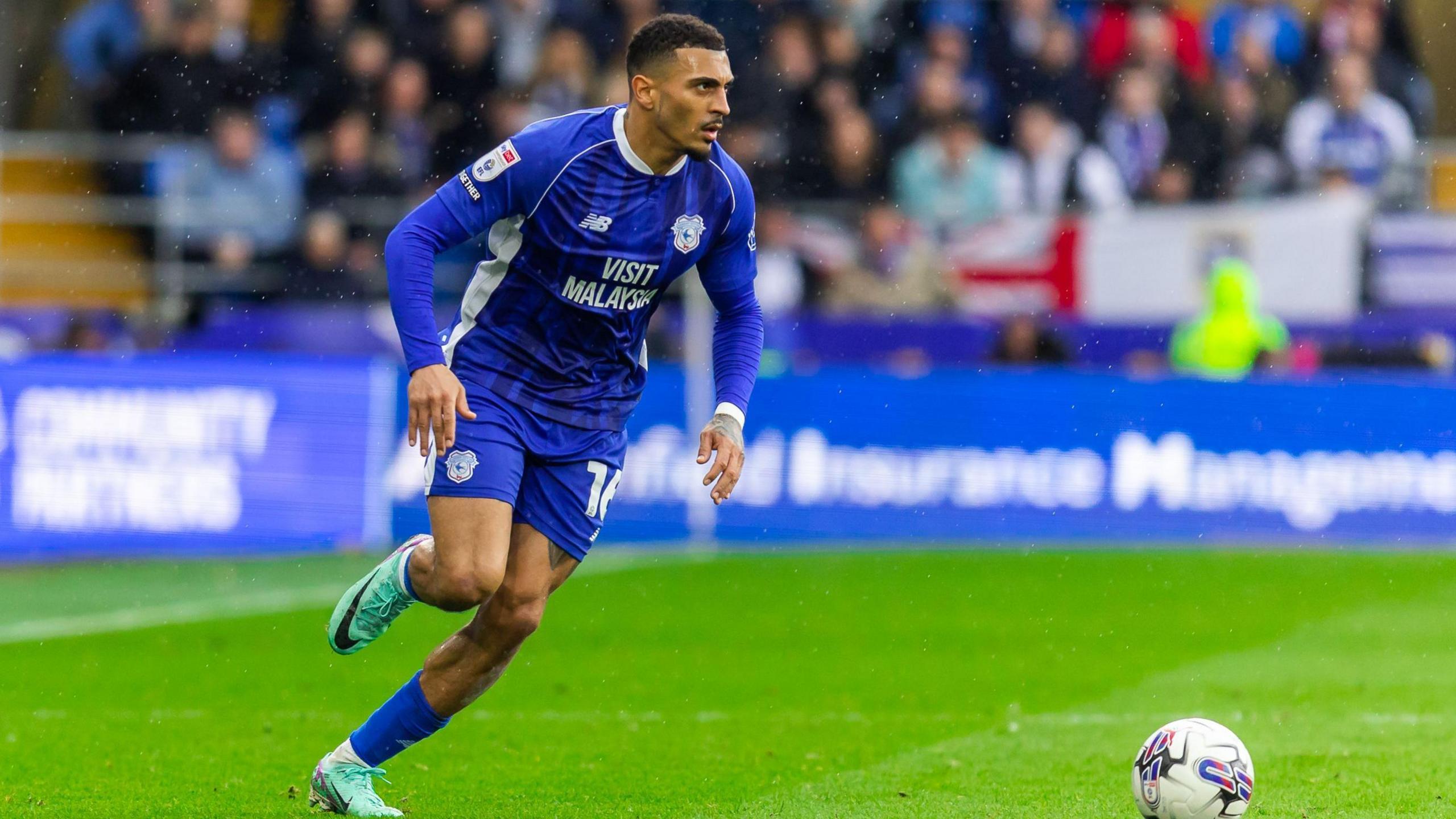 Karlan Grant in action during his loan with Cardiff City