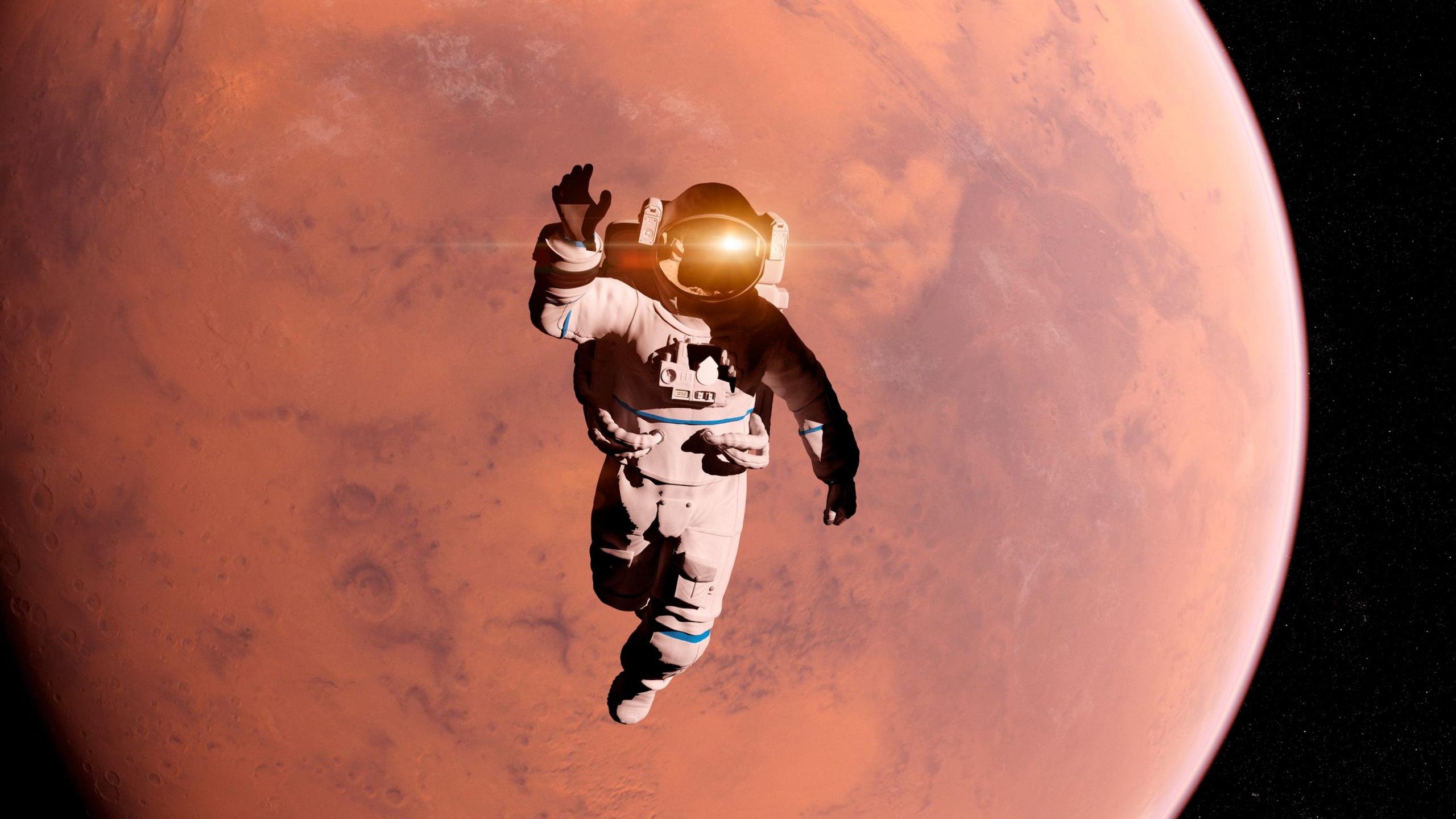 Astronaut in front of Mars