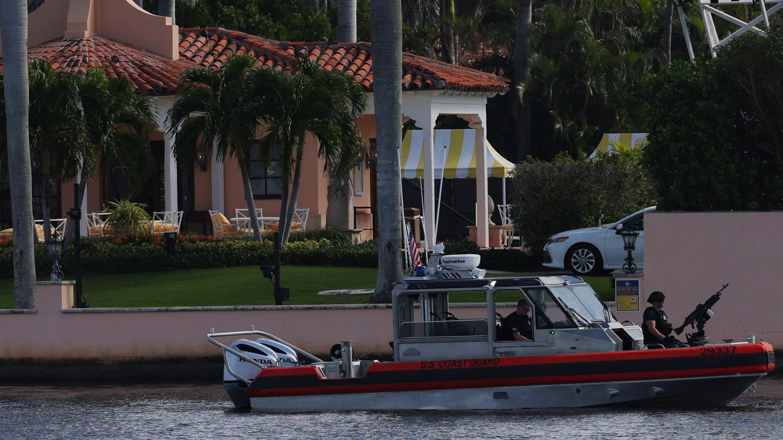 A U.S. Coast Guard boat patrols outside U.S. President-elect Donald Trump’s residence at Mar-A-Lago 