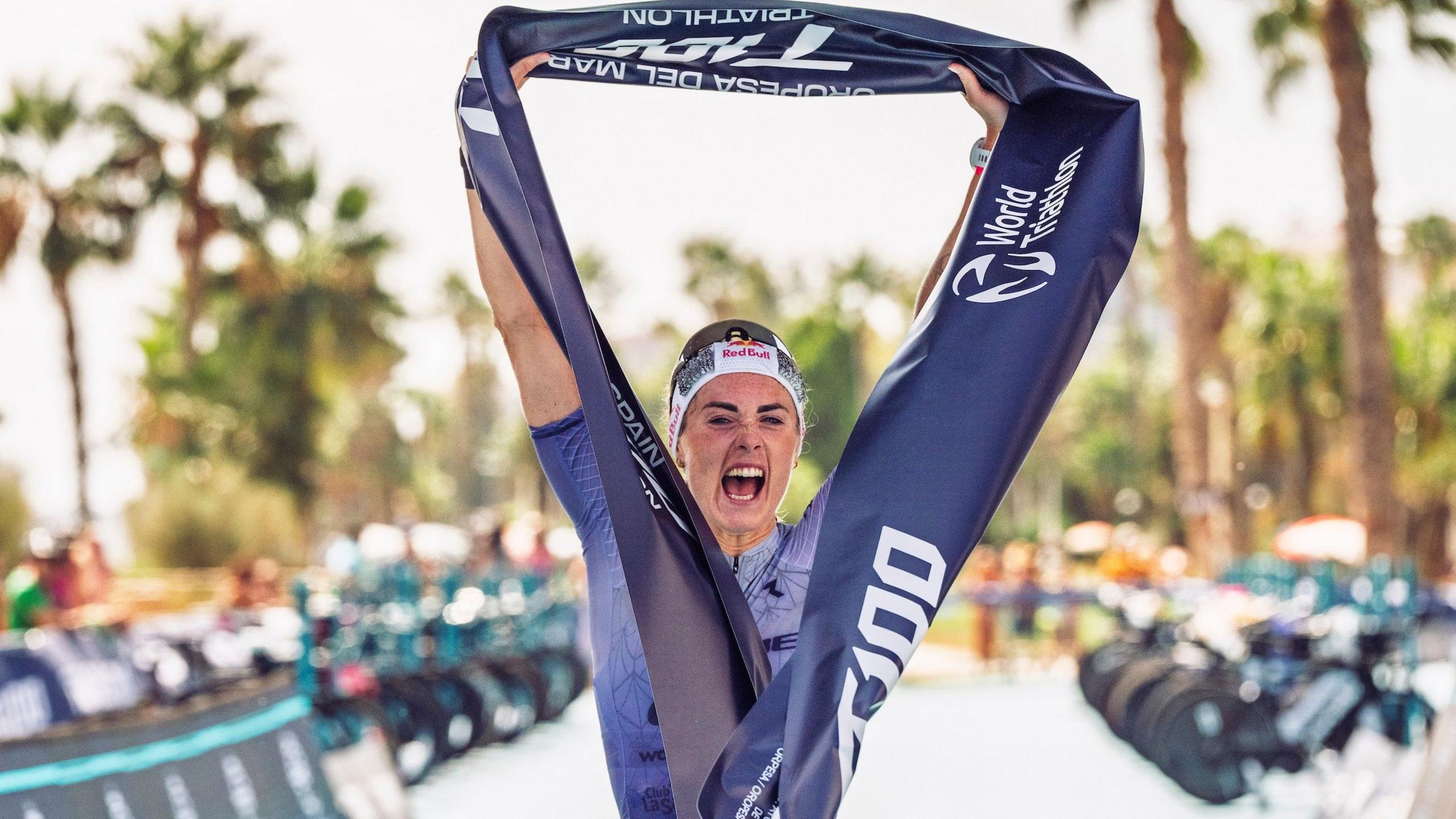 Lucy Charles-Barclay crosses the line