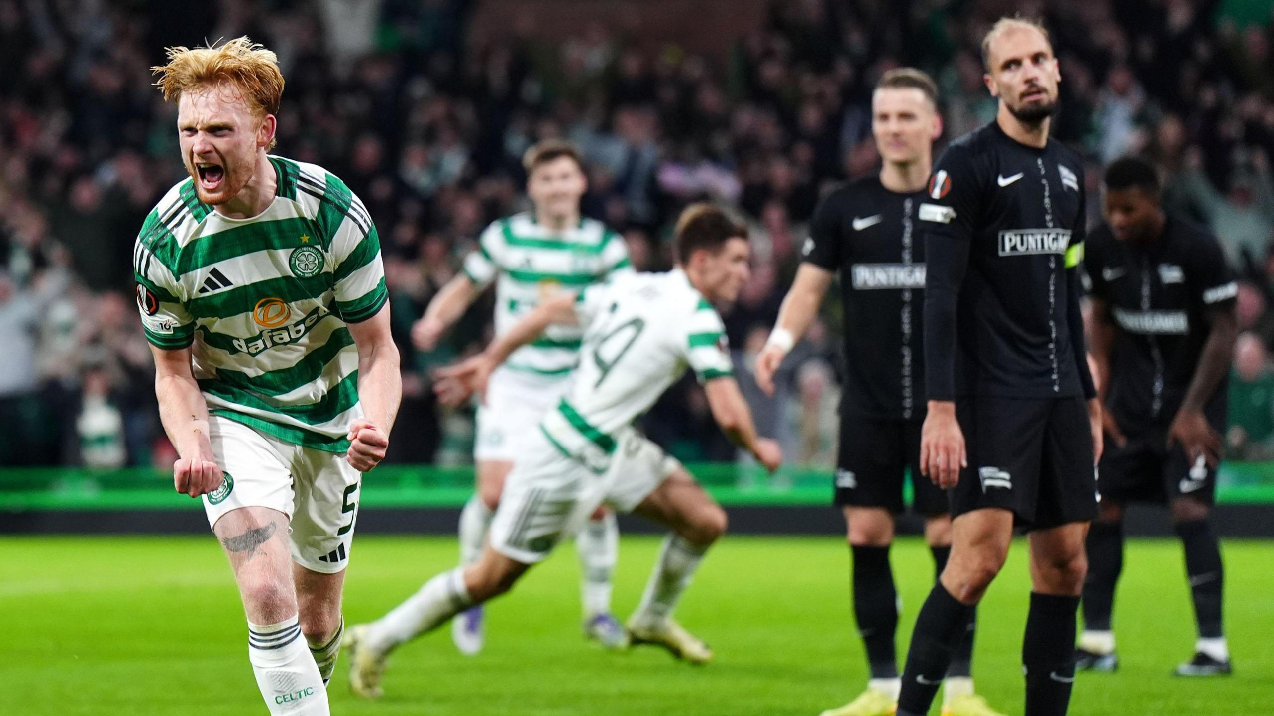 Liam Scales celebrates scoring for Celtic