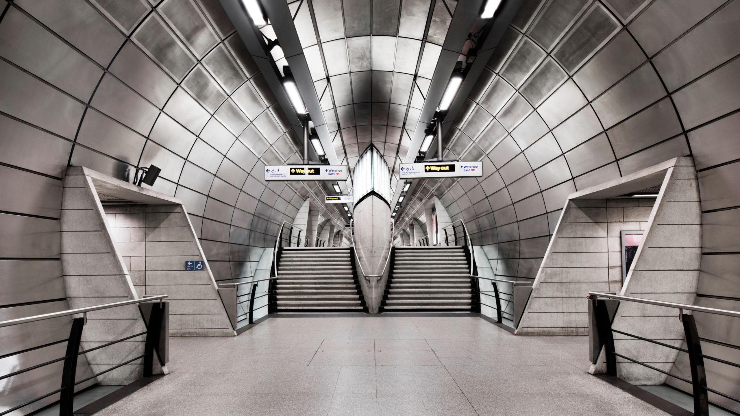 The steel-panelled tunnel leading to the platforms.
