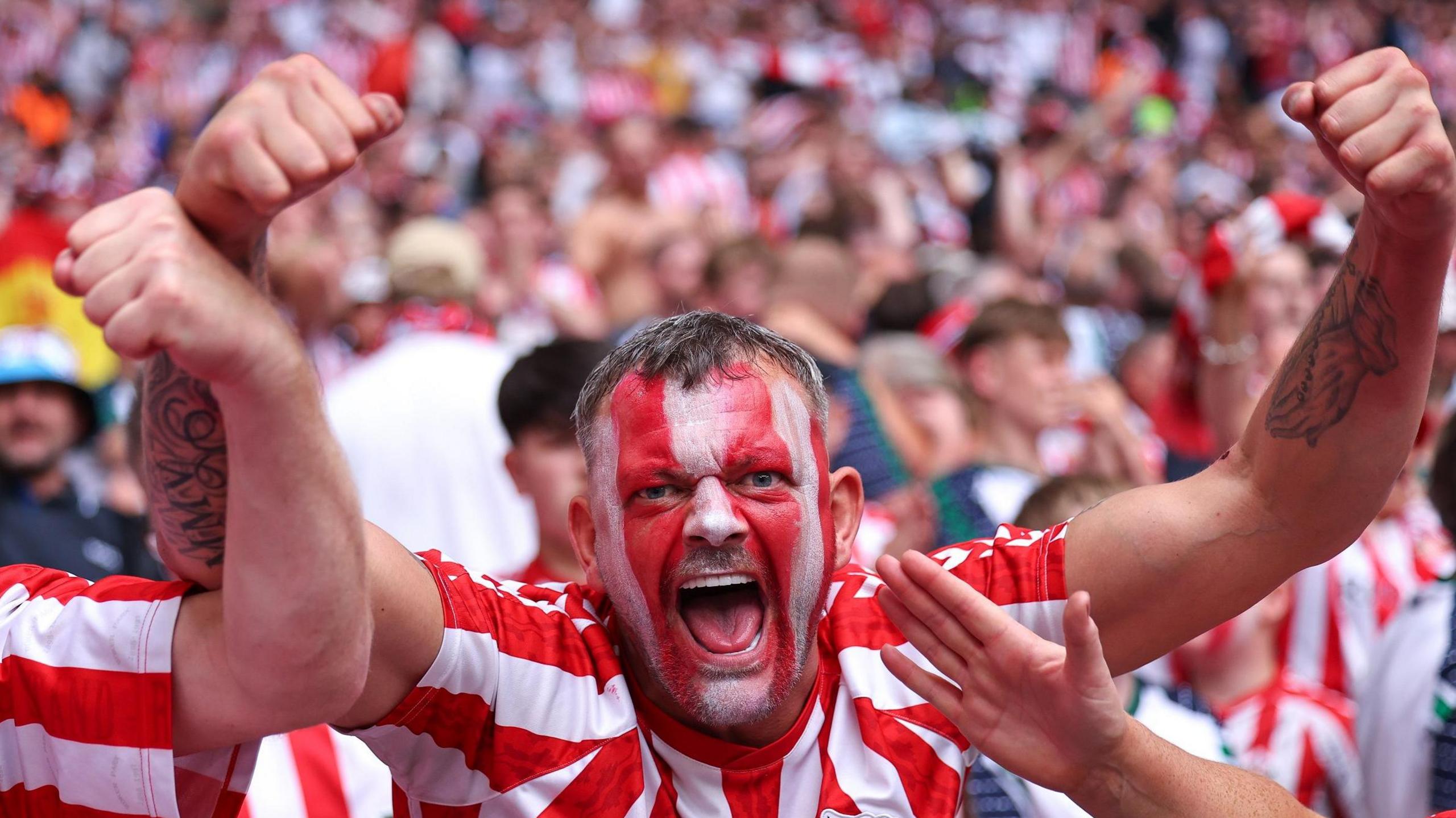 Sunderland fan celebrates promotion after play-off final win against Sheffield United