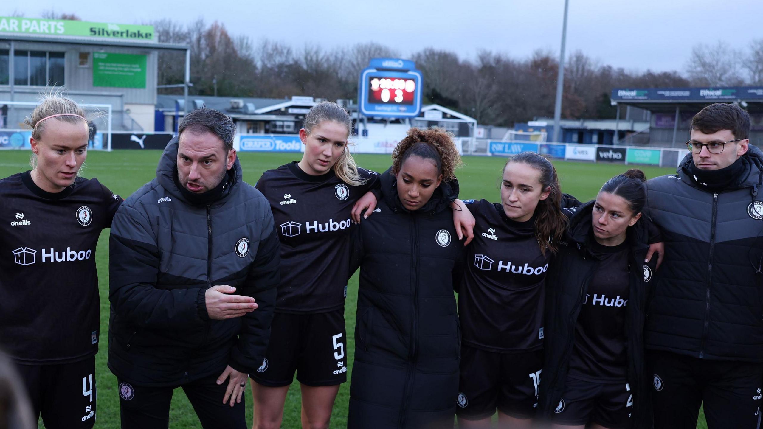 Stephen Kirby (second left) gives a team talk in a huddle after Bristol City's FA Cup third round win against Southampton