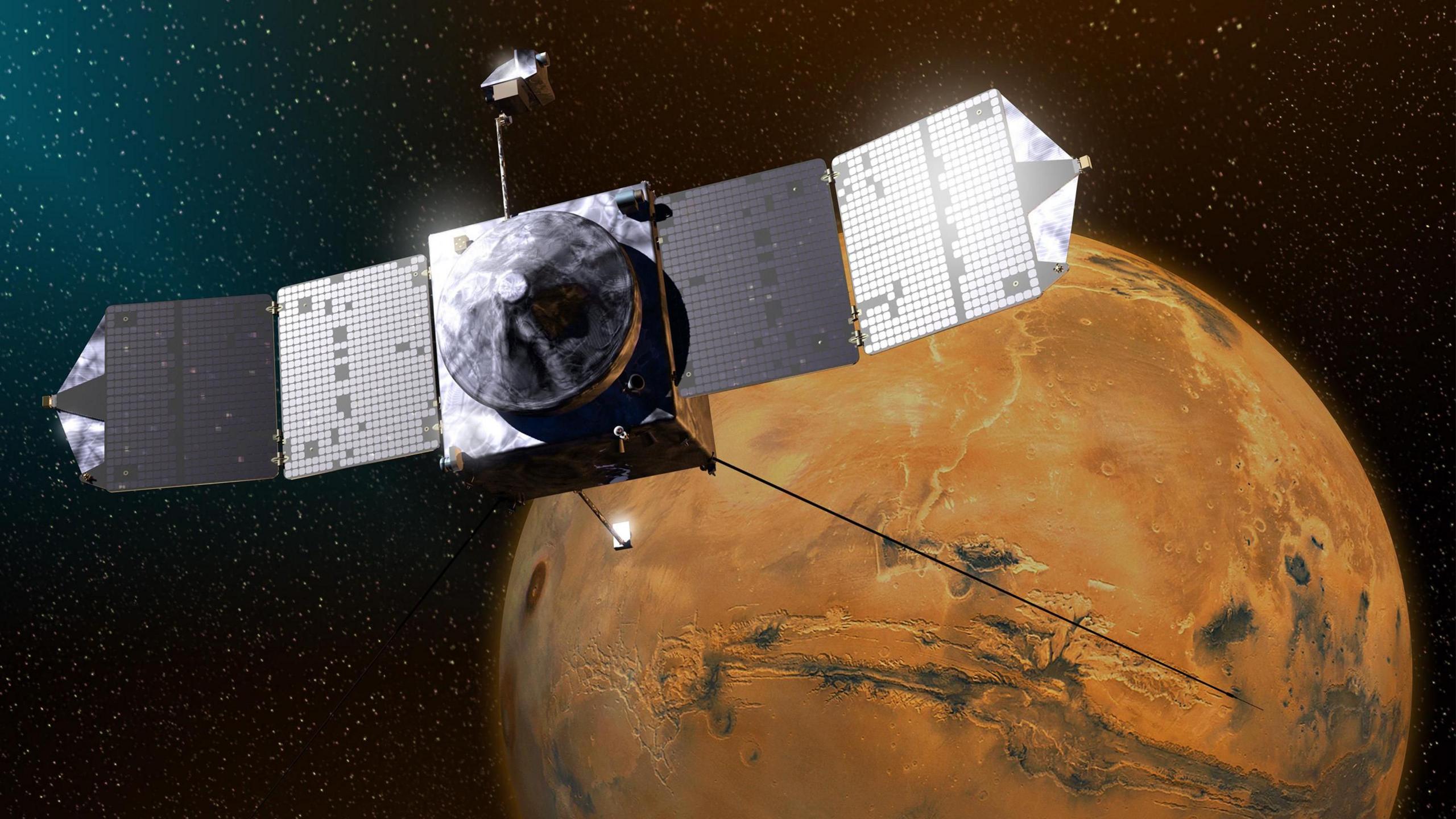 maven orbiting the planet mars in space