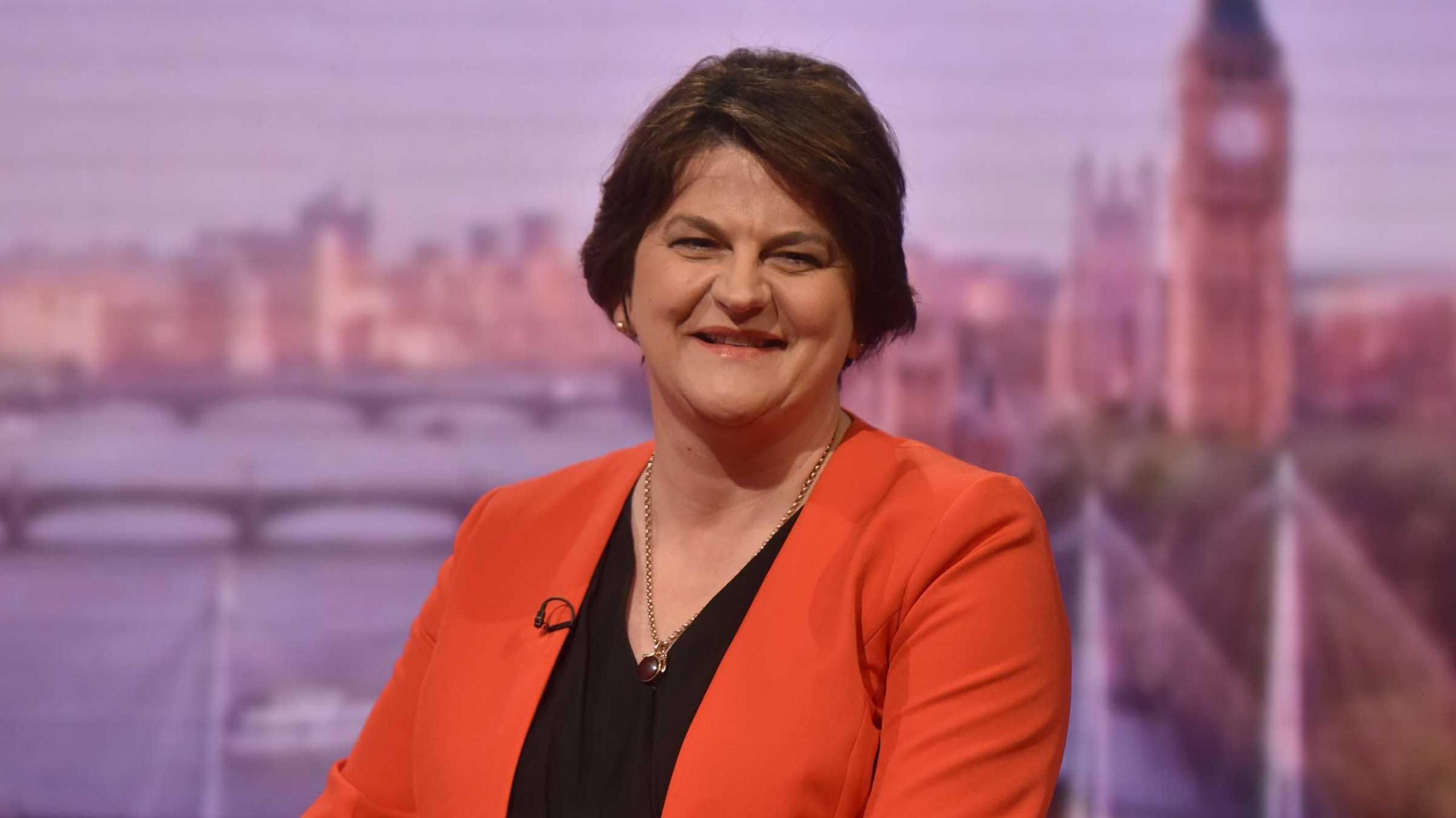 Baroness Arlene Foster sitting in TV studio smiling 