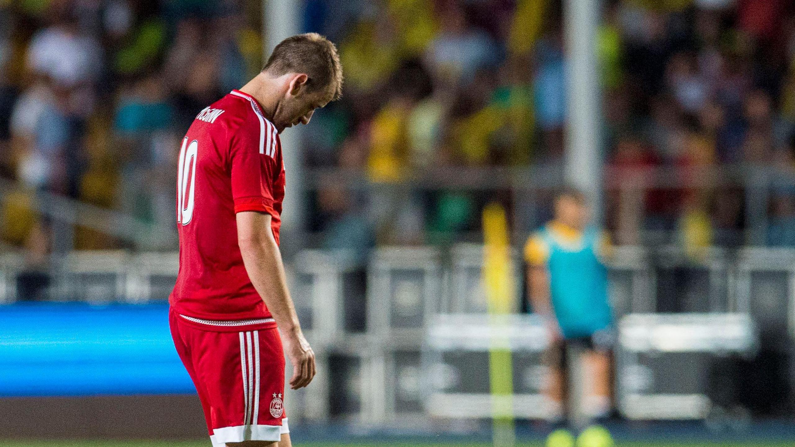 Niall McGinn looks dejected