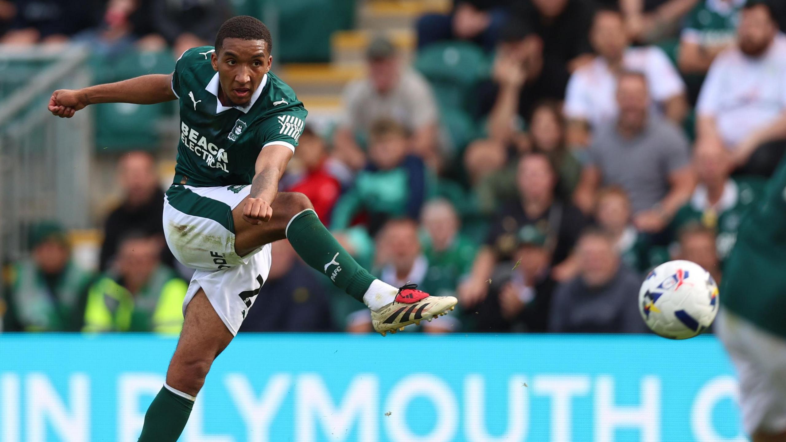 Bradley Ibrahim strikes the ball for Plymouth Argyle