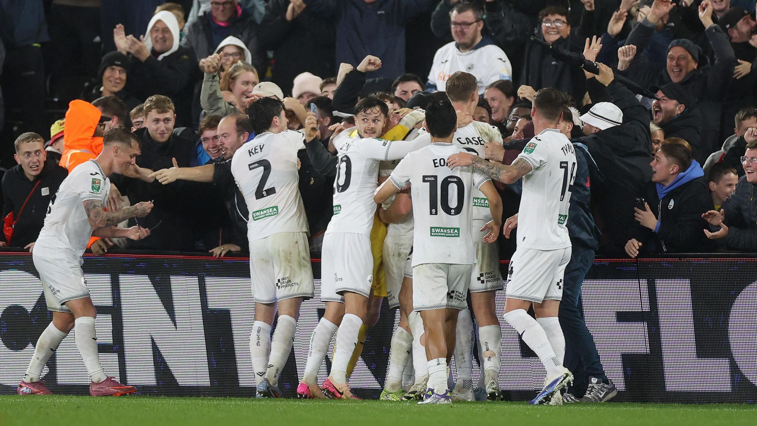 Swansea players celebrate during their victory over Nottingham Forest