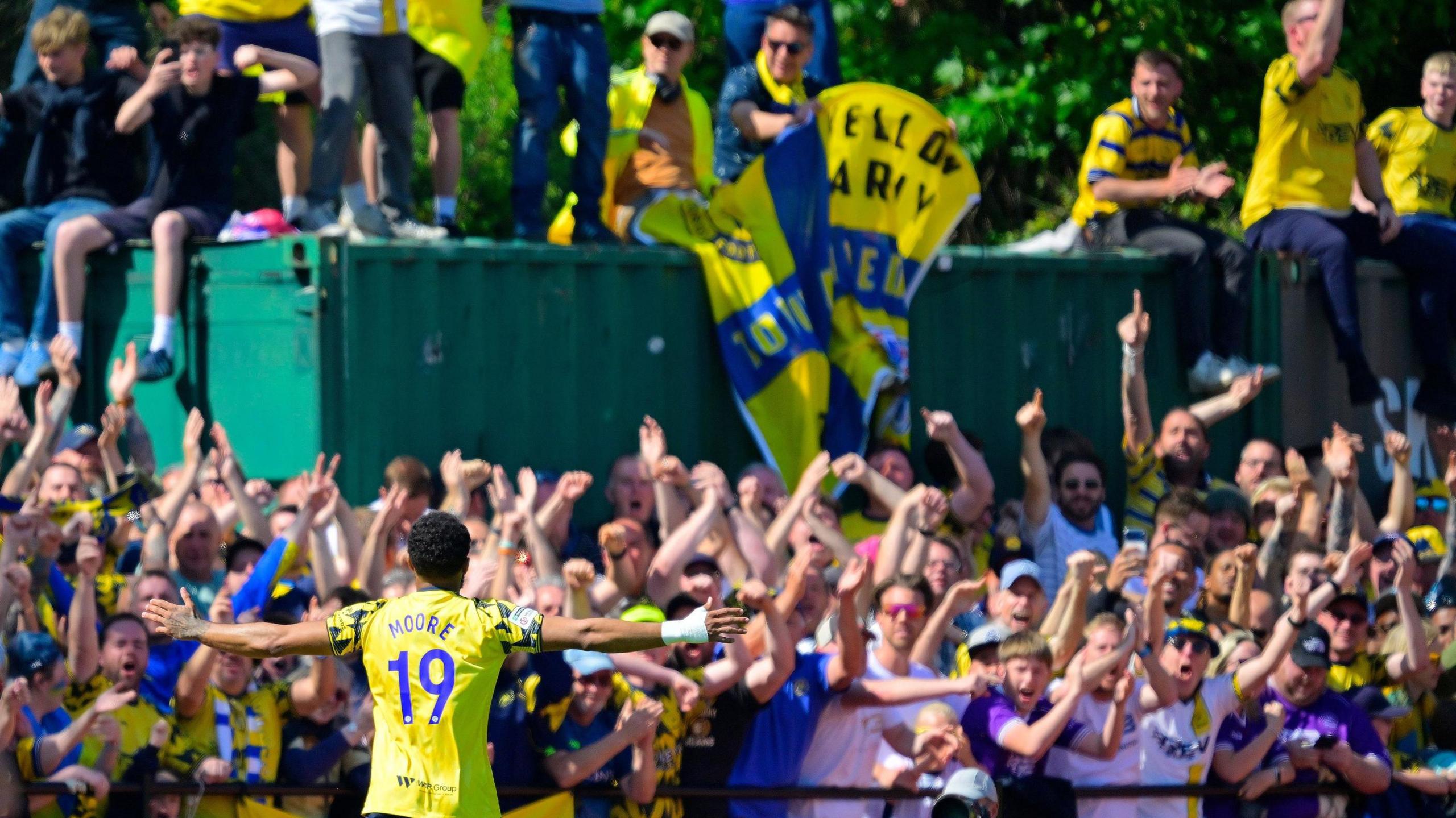 Torquay fans celebrate Deon Moore's opening goal