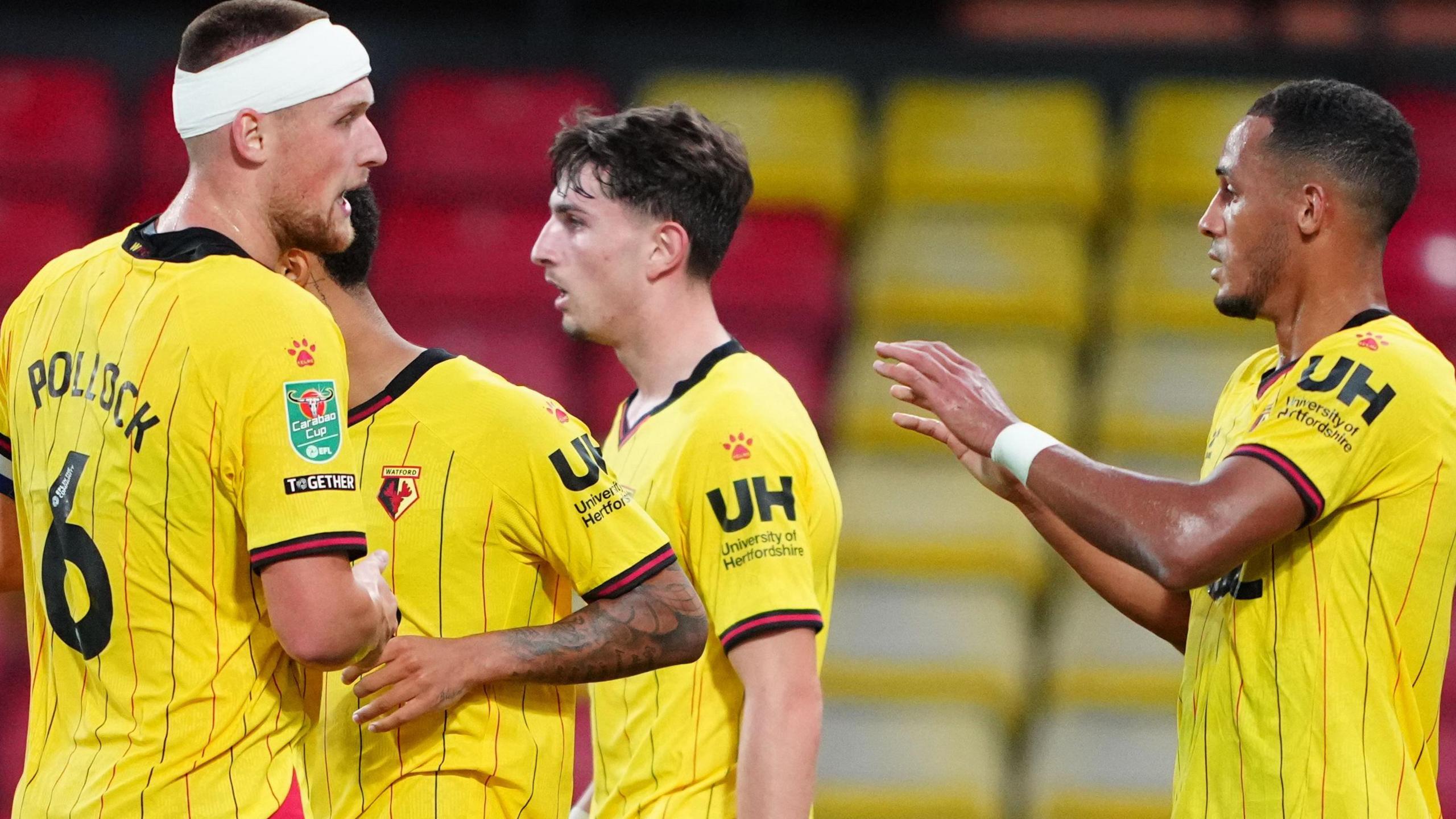 Watford celebrate a goal against MK Dons