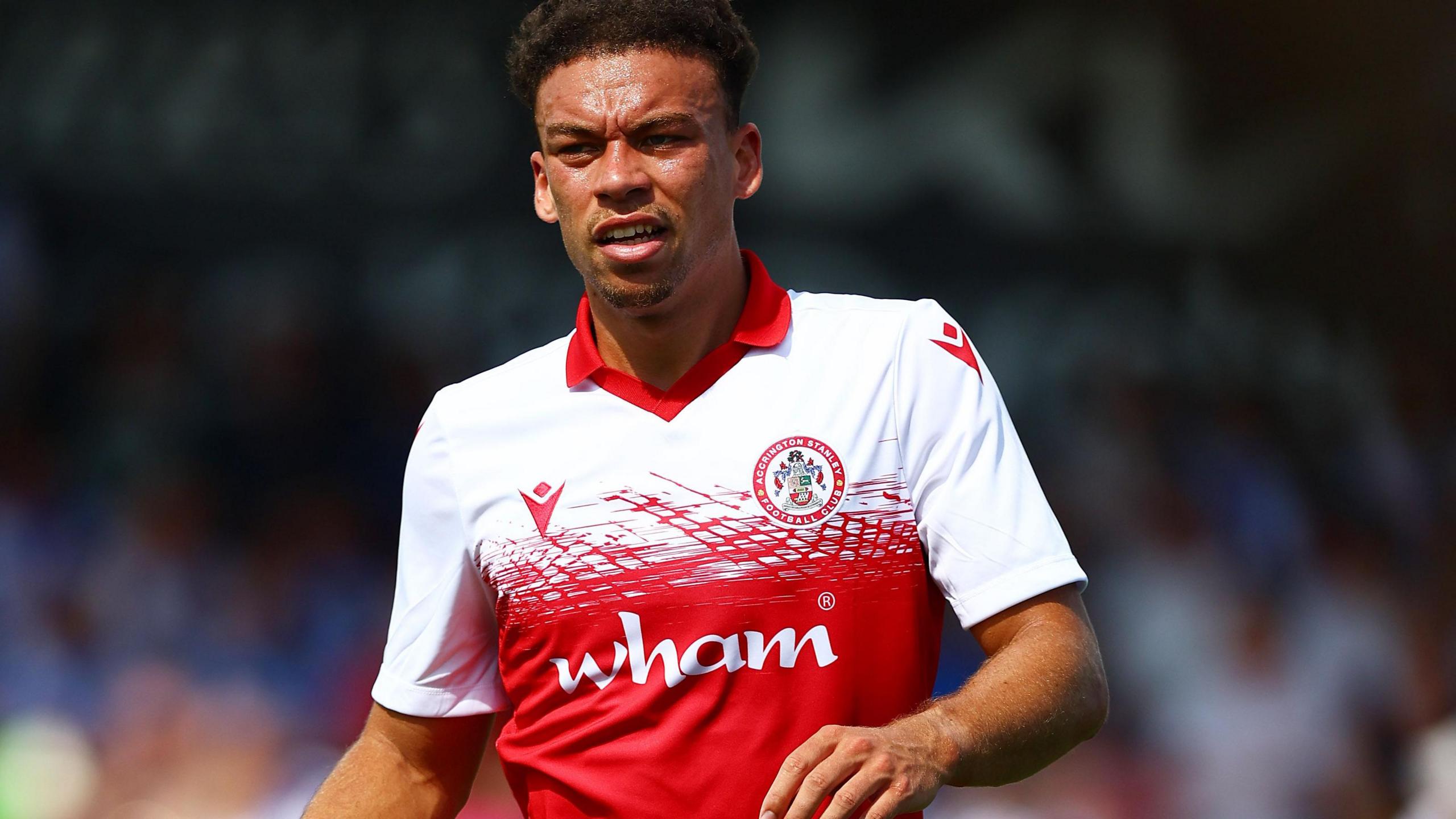 Isaac Sinclair in friendly action for Accrington Stanley against Blackburn Rovers in July.