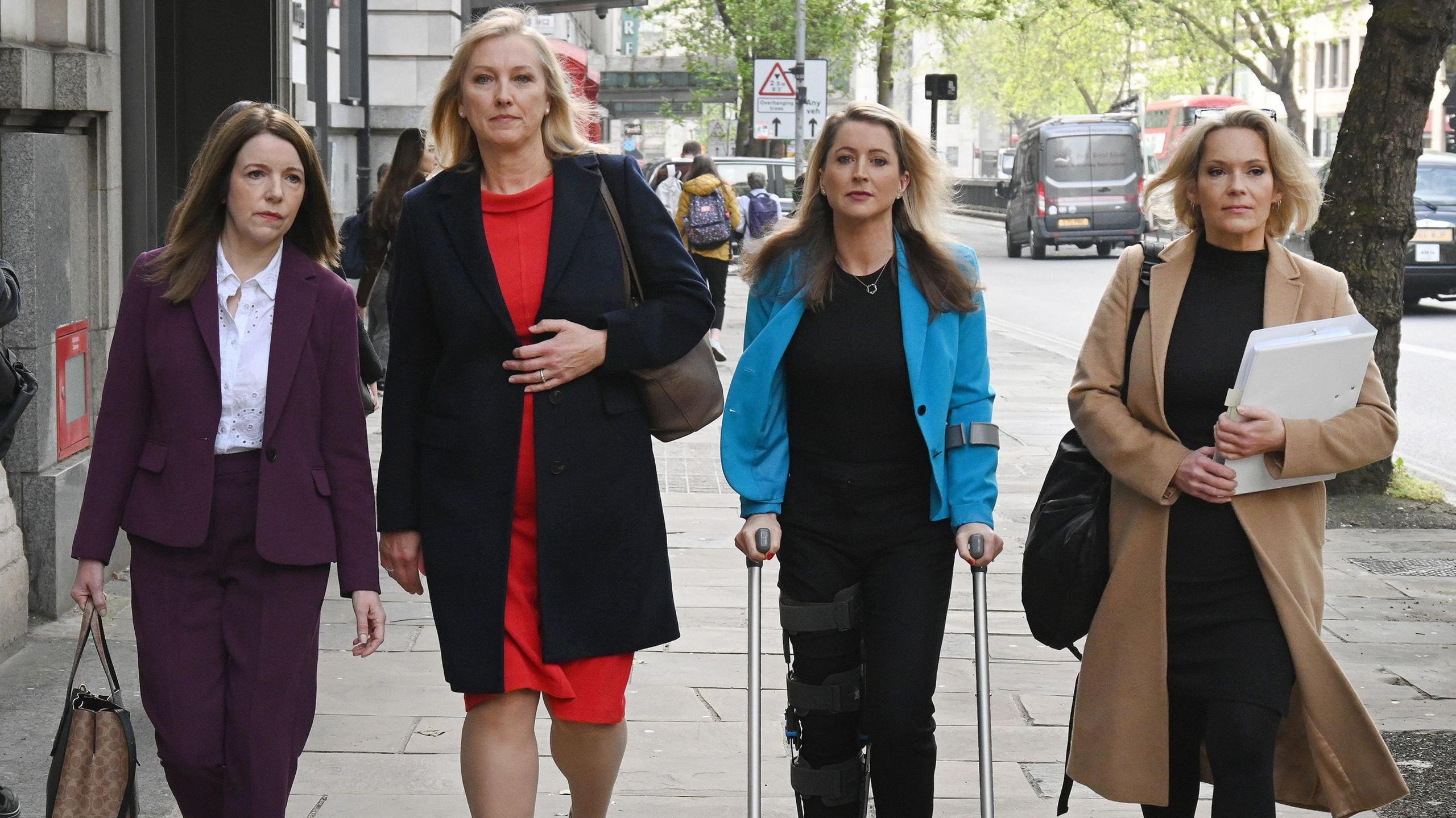 (L-R) Annita McVeigh, Martine Croxall, Karin Giannone and Kasia Madera, walk along Kingsway as they arrive for employment tribunal in 2024.