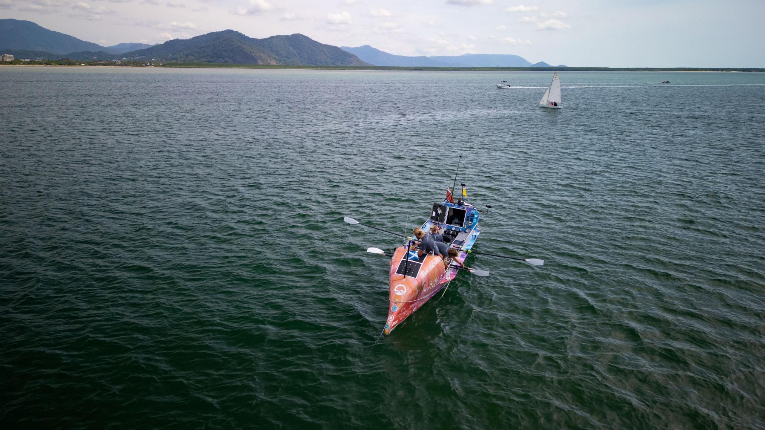 An aerial image of the brothers arriving at Cairns in Australia in their rowing boat.