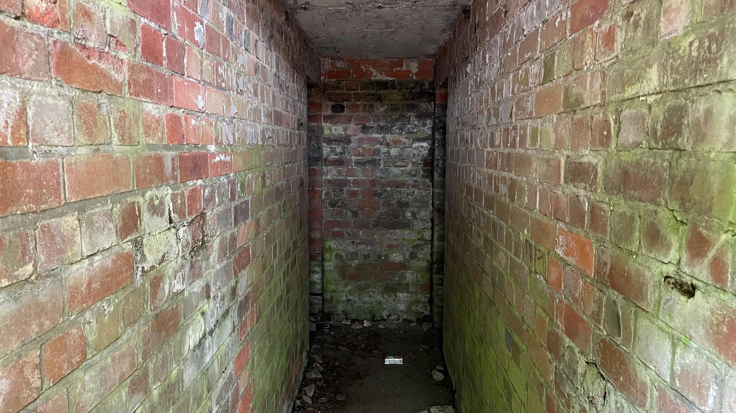 Looking down the main corridor of the bunker