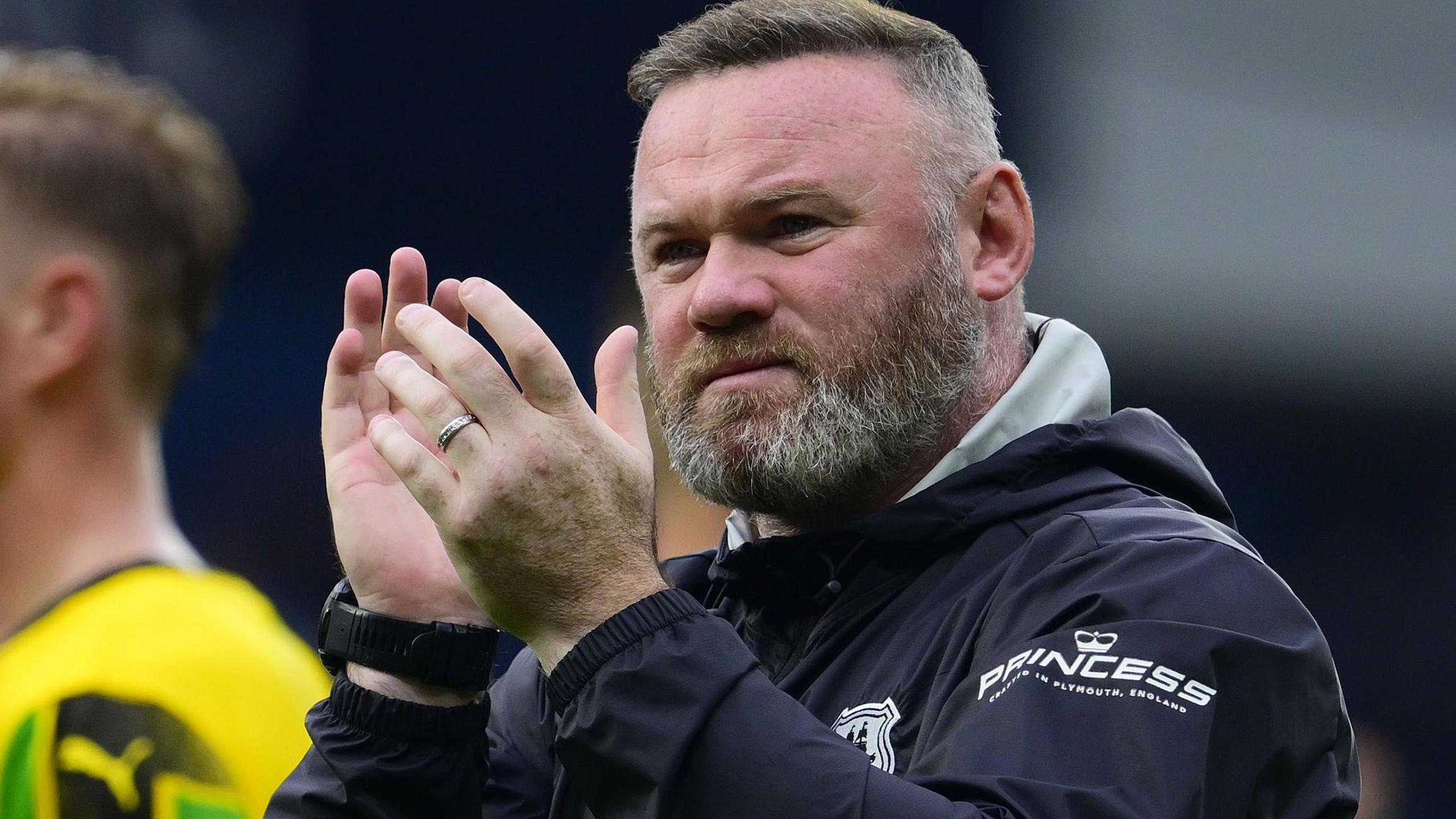 Wayne Rooney applauds the fans