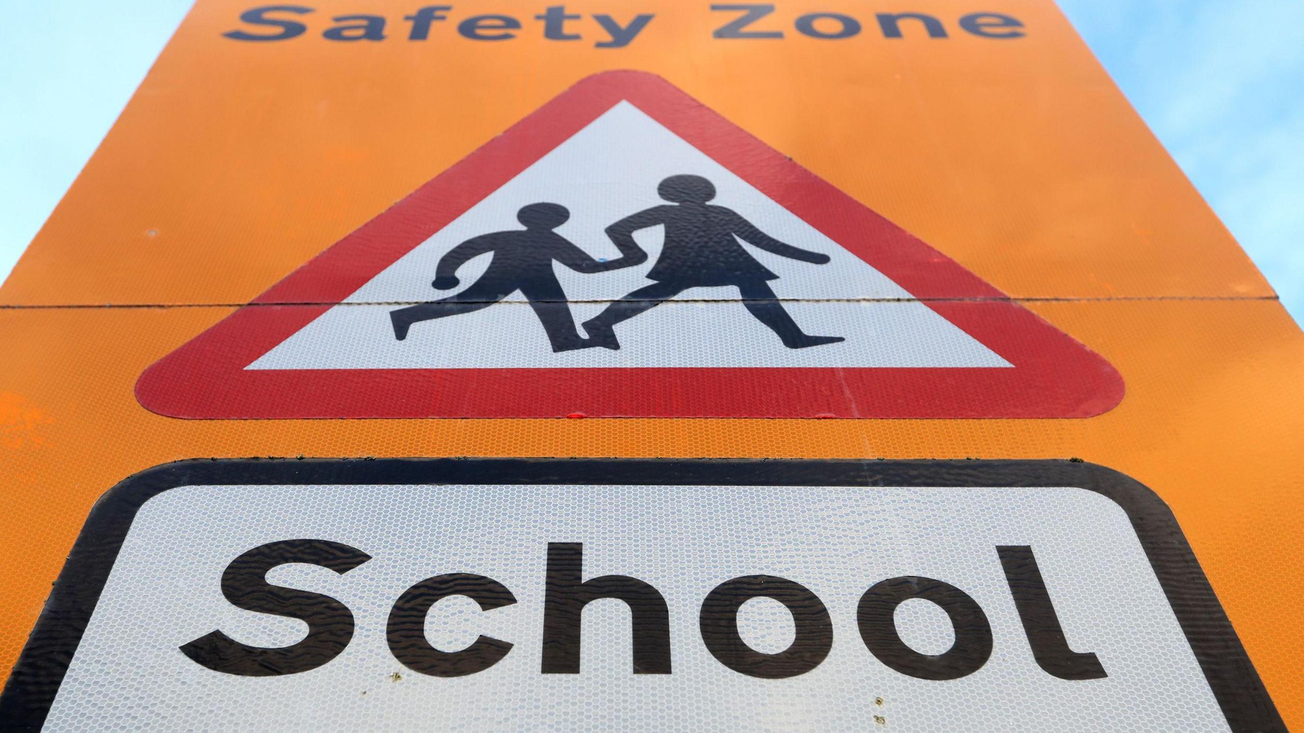 General view of a school safety zone sign