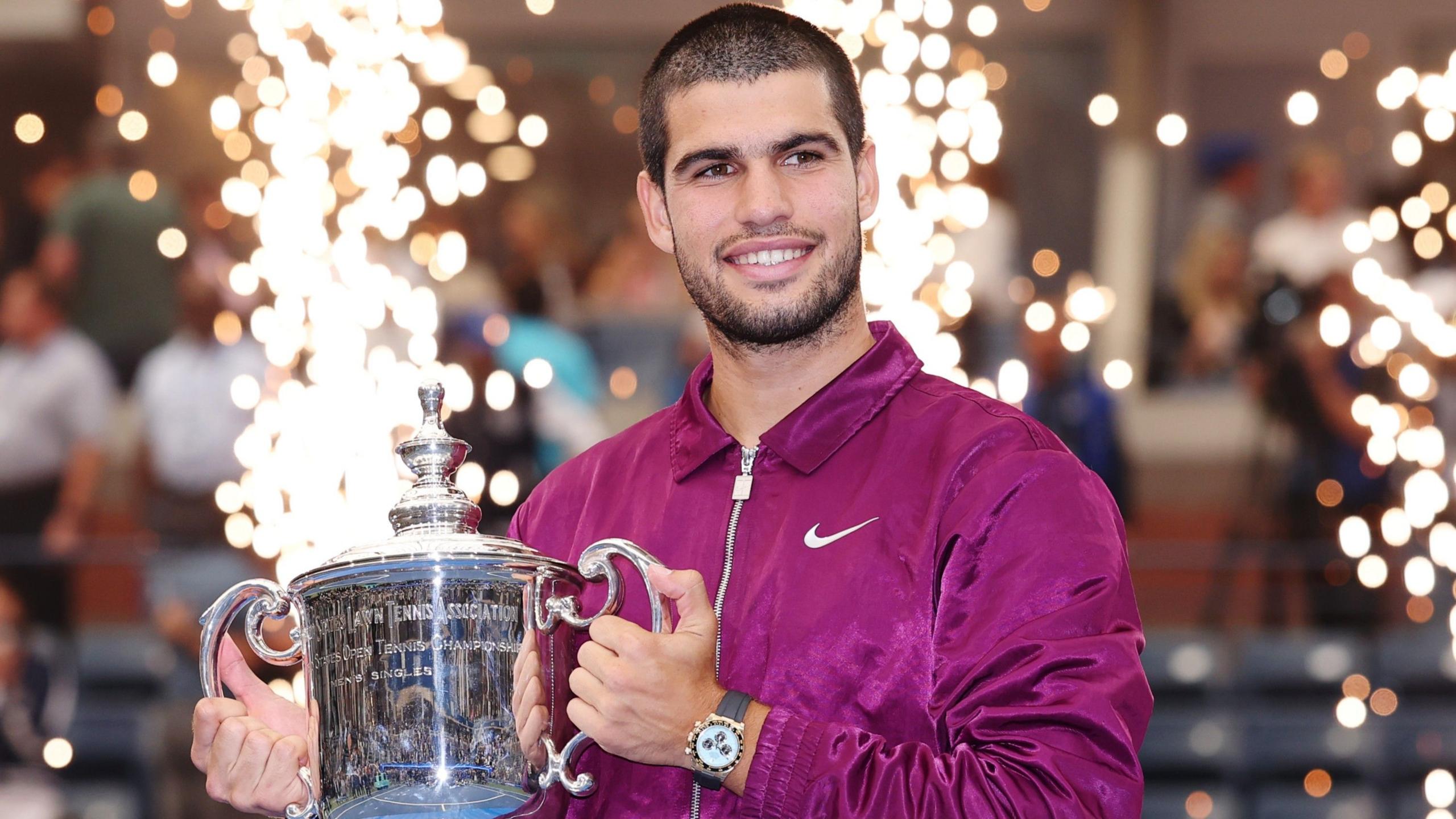 Carlos Alcaraz with the US Open trophy in 2025