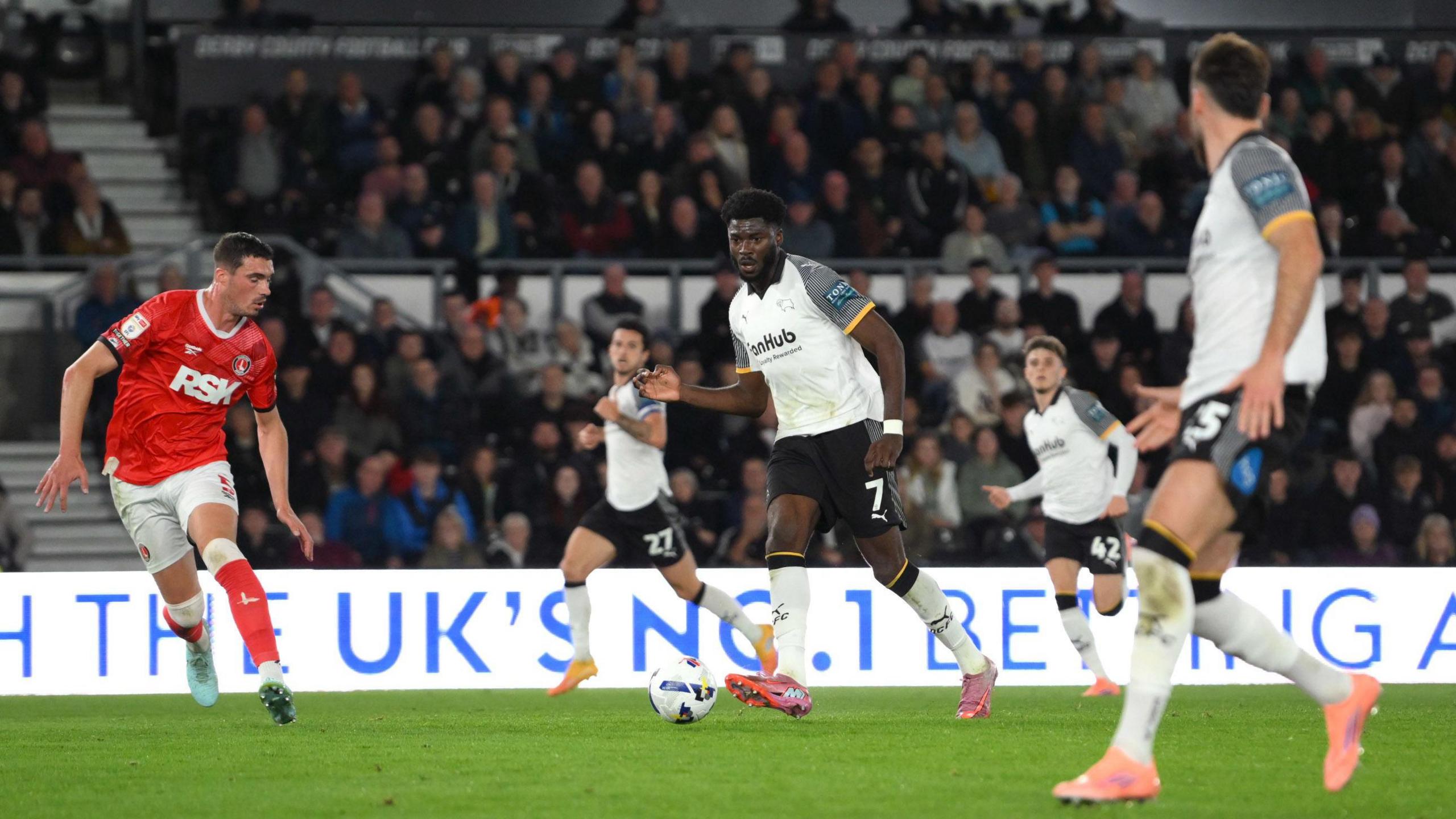 Derby County's Patrick Agyemang plays a pass during the game against Charlton