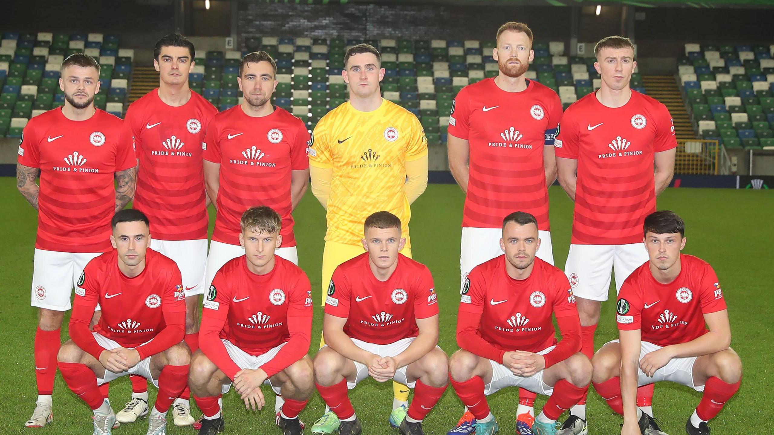 Larne team pose for a photograph before facing Shamrock Rovers