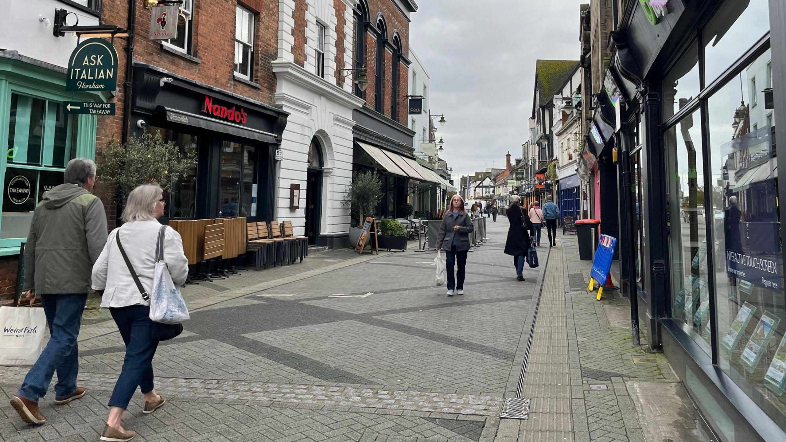 East Street in Horsham with people walking up it