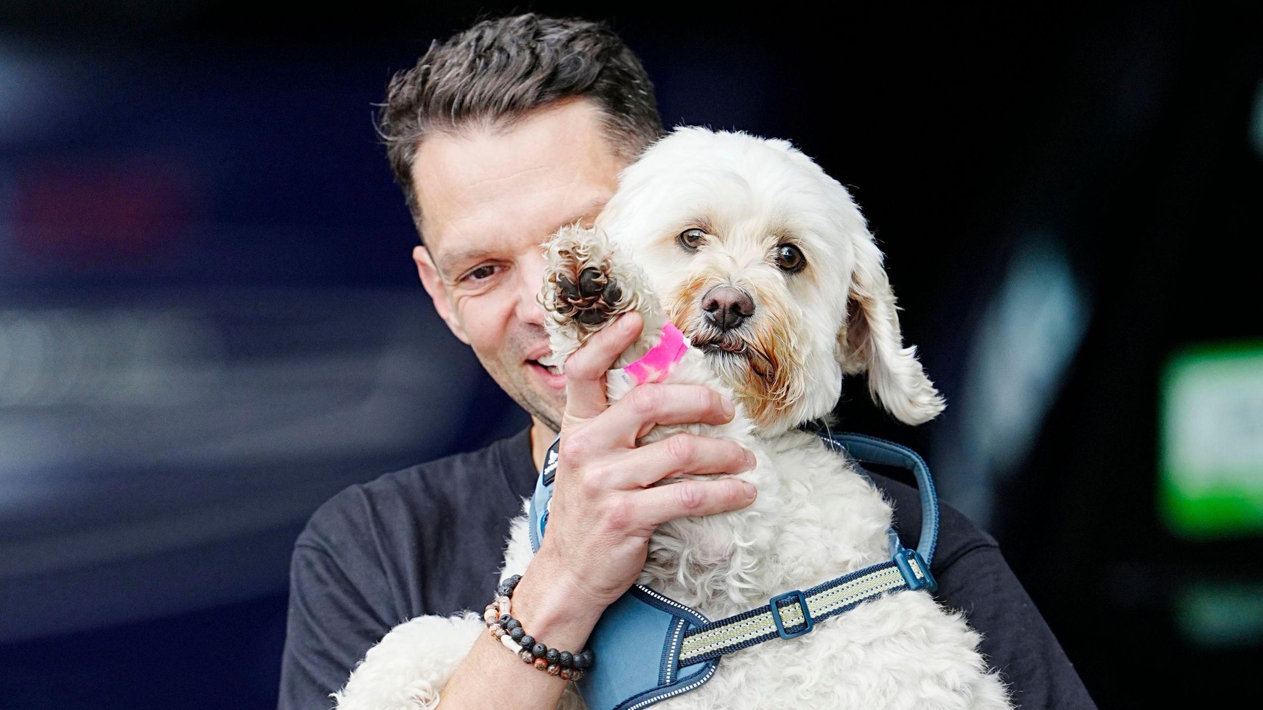 Reggie the dog with his owner James