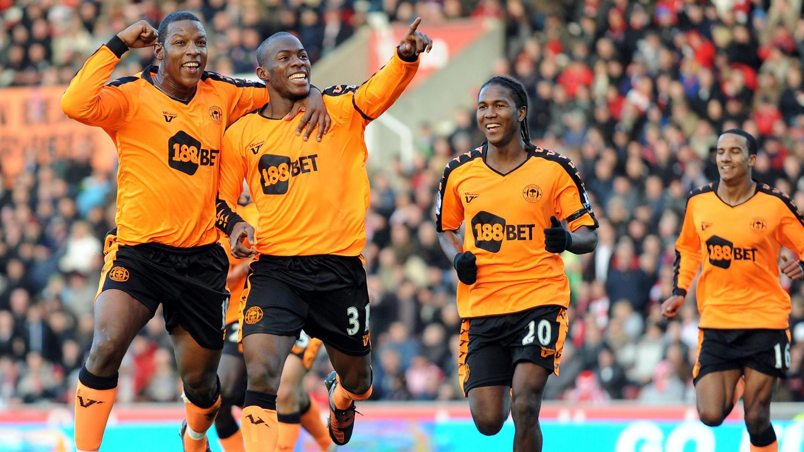 Wigan players celebrate Maynor Figueroa's goal against Stoke in 2009