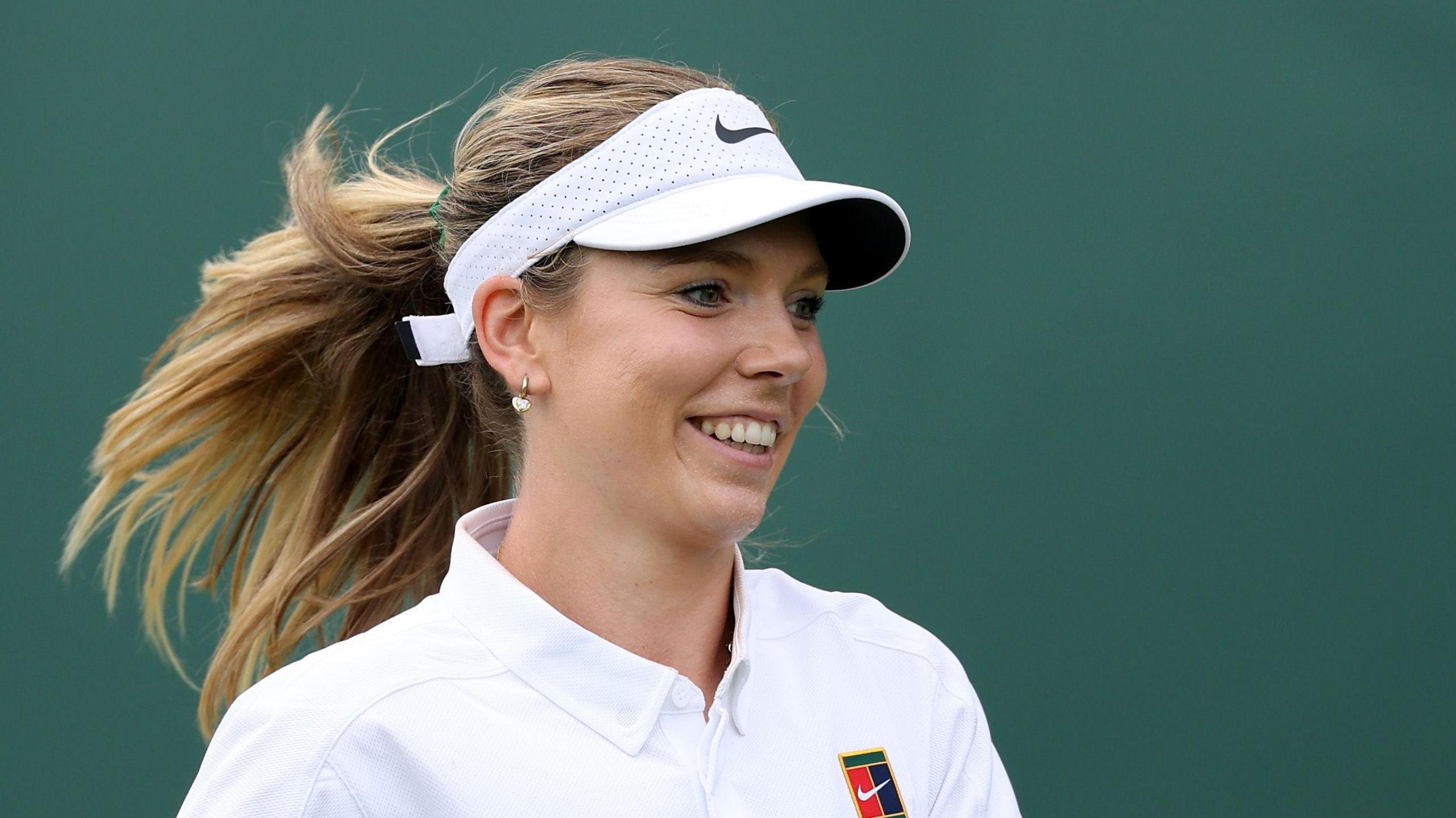 Katie Boulter laughs during Wimbledon practice