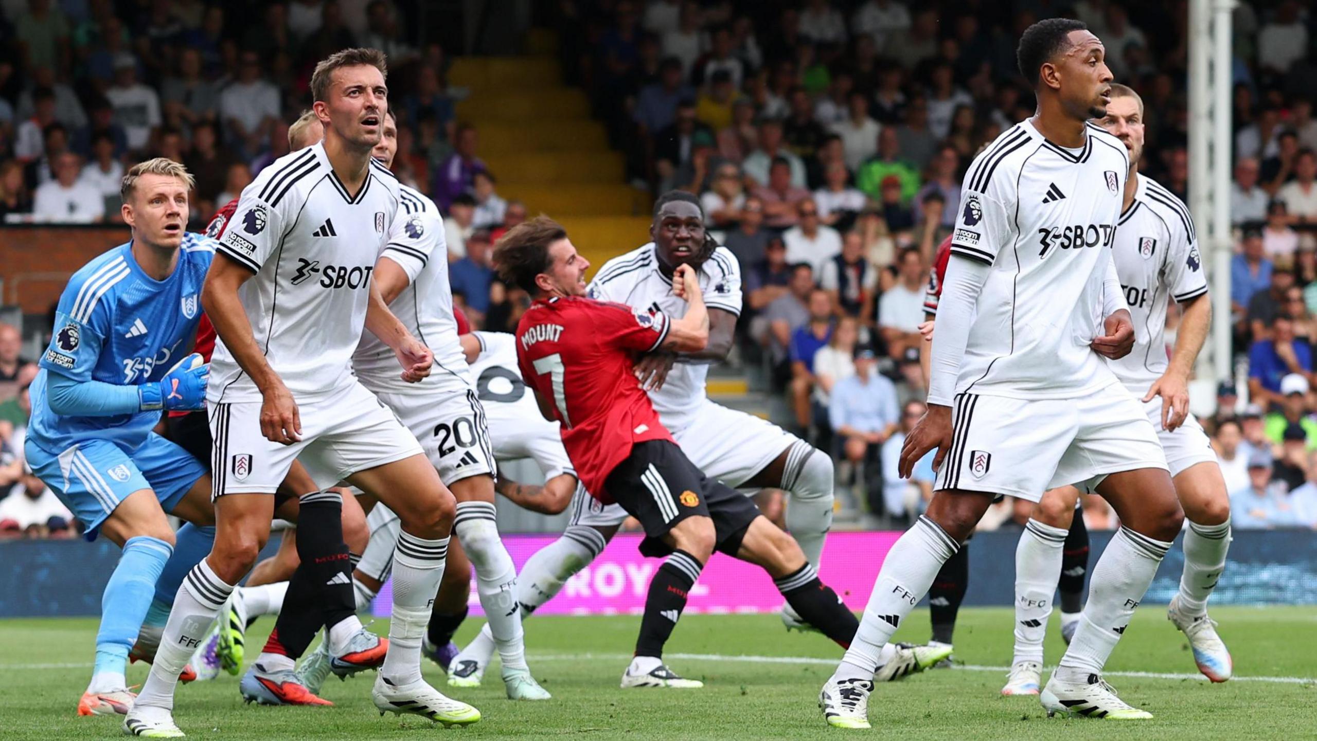 Fulham's Calvin Bassey fouls Manchester United's Mason Mount in the penalty at Craven Cottage