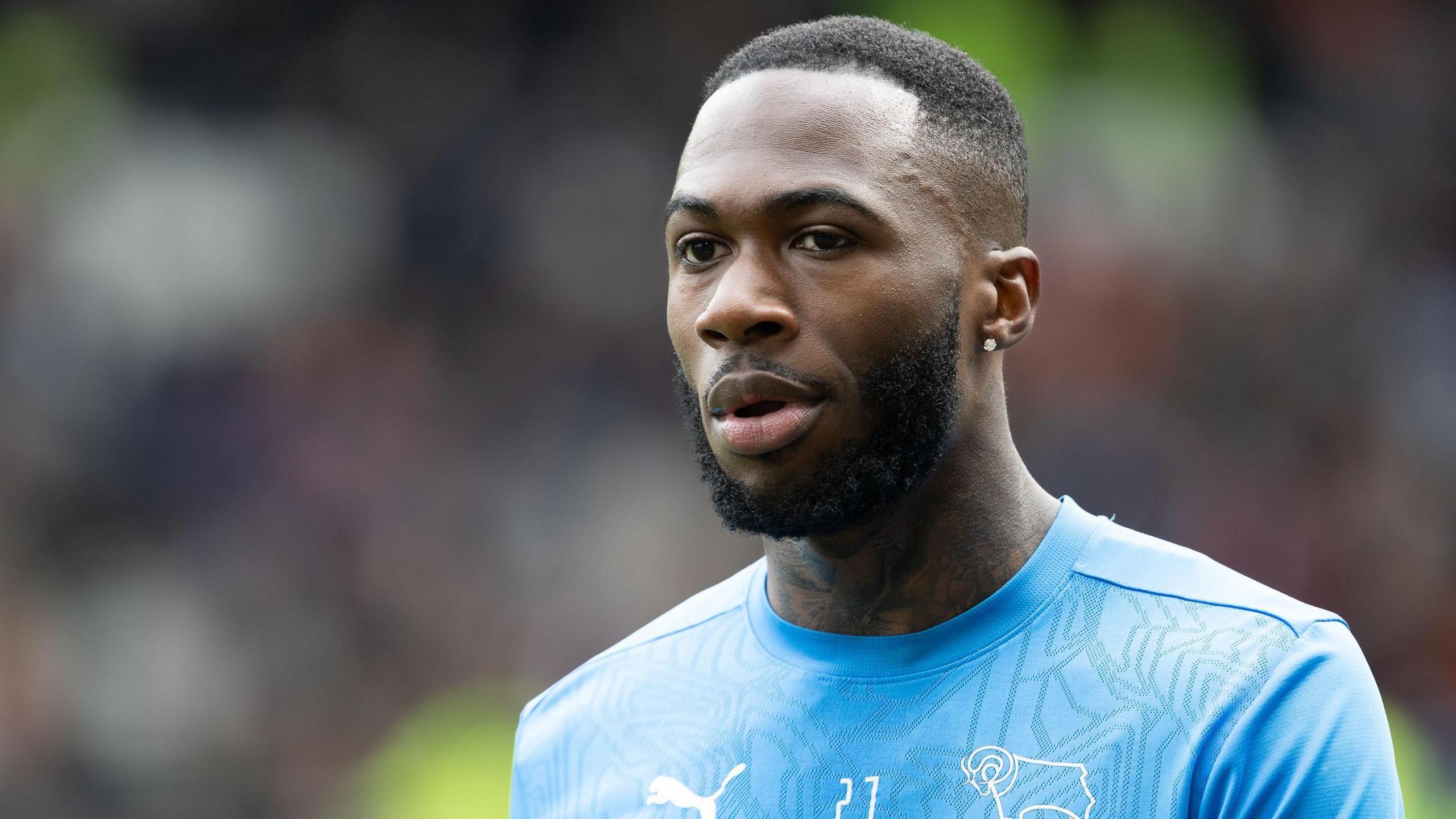 Corey Blackett-Taylor warming up for Derby County