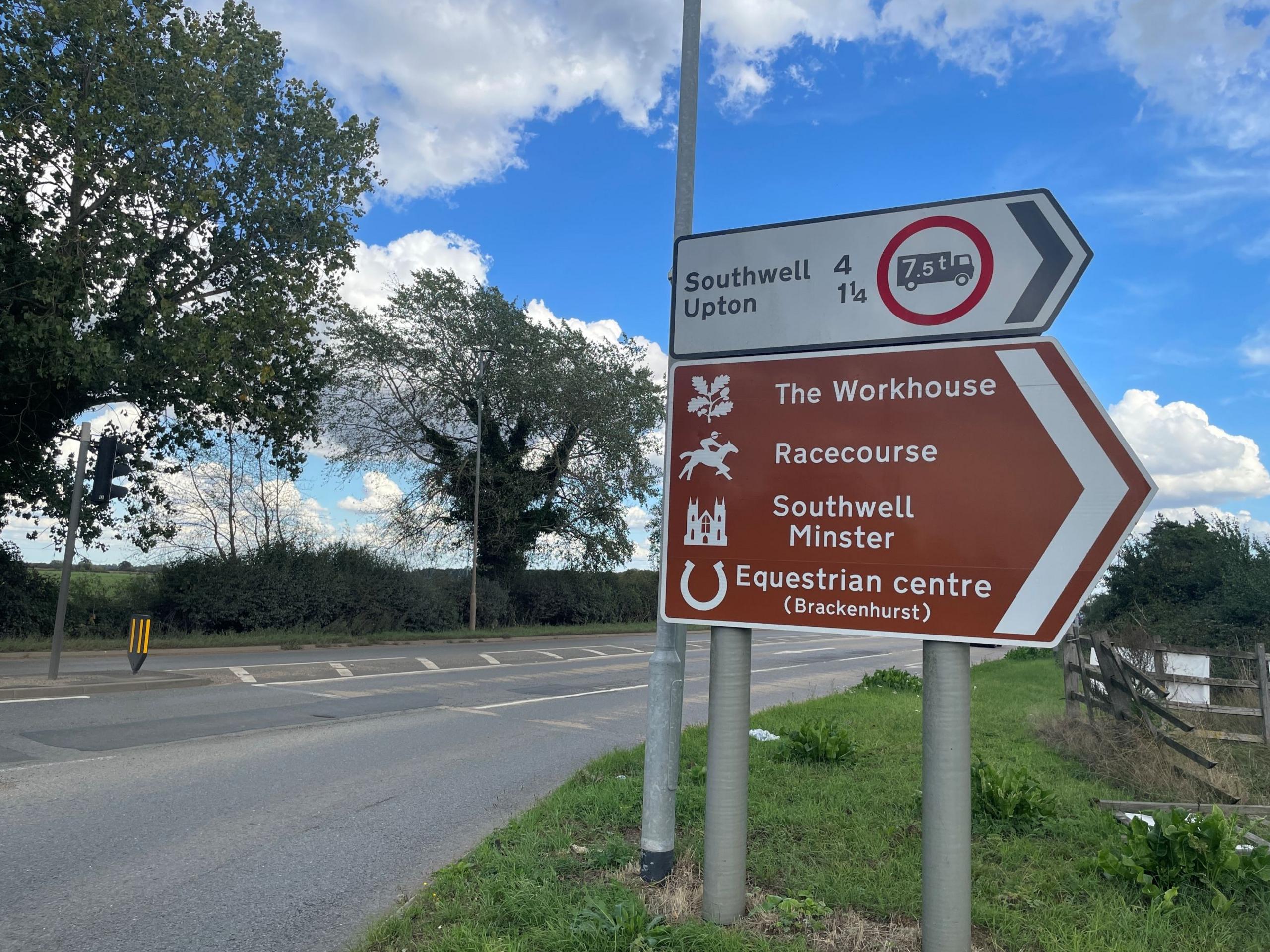 A road sign directing people towards Upton and Southwell