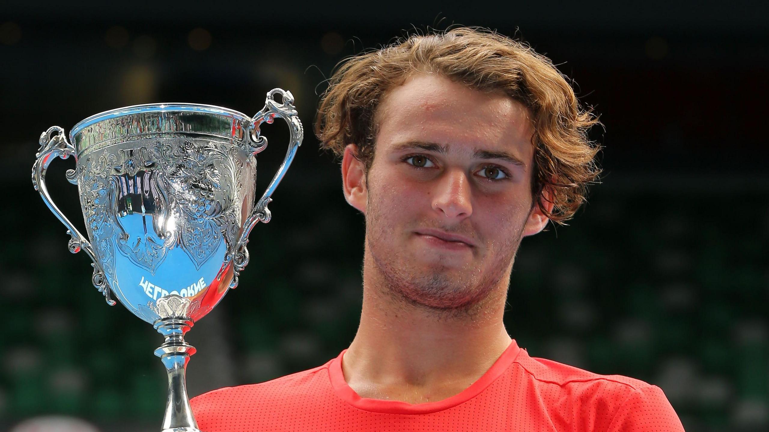 Oliver Anderson lifts the Australian Open boys' singles title